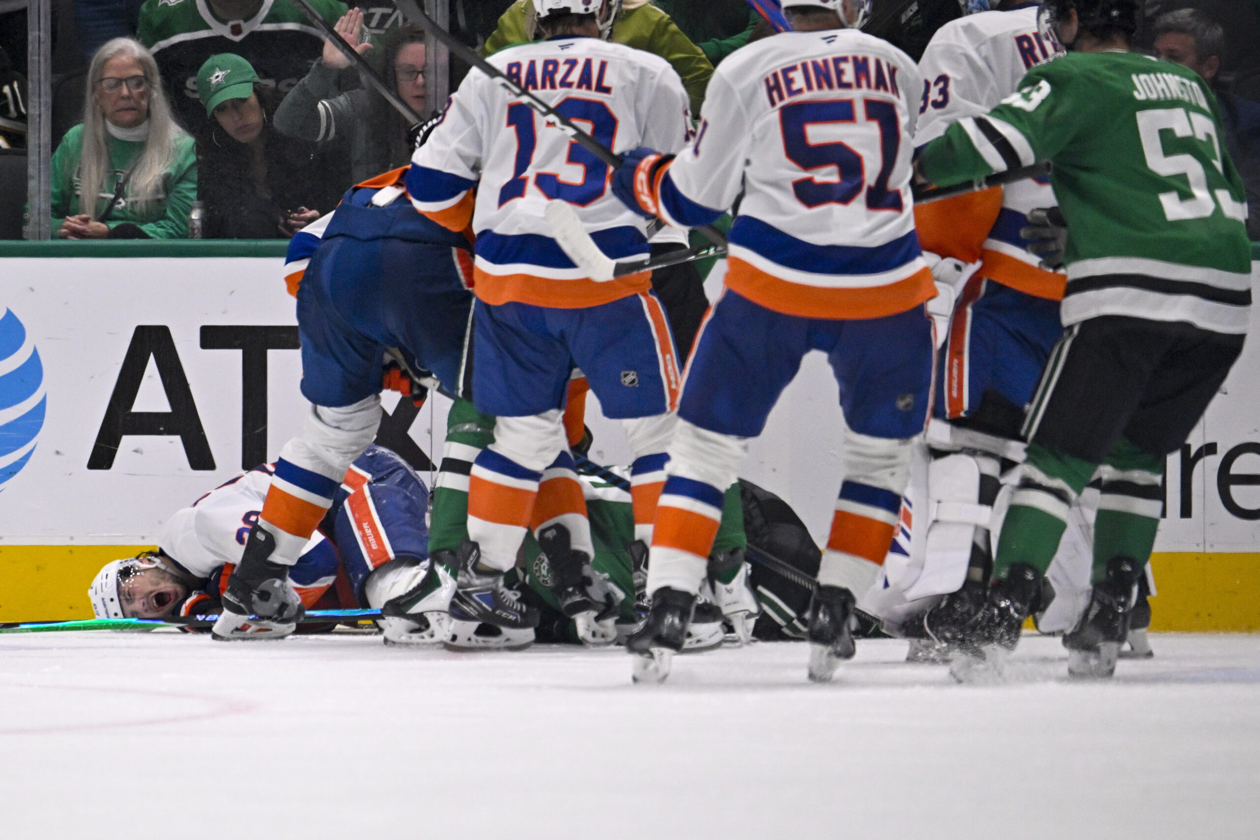 Nov 18, 2025; Dallas, Texas, USA; Dallas Stars right wing Mikko Rantanen (96) is called for a game misconduct penalty for boarding on New York Islanders defenseman Alexander Romanov (28) during the third period at the American Airlines Center. Mandatory Credit: Jerome Miron-Imagn Images