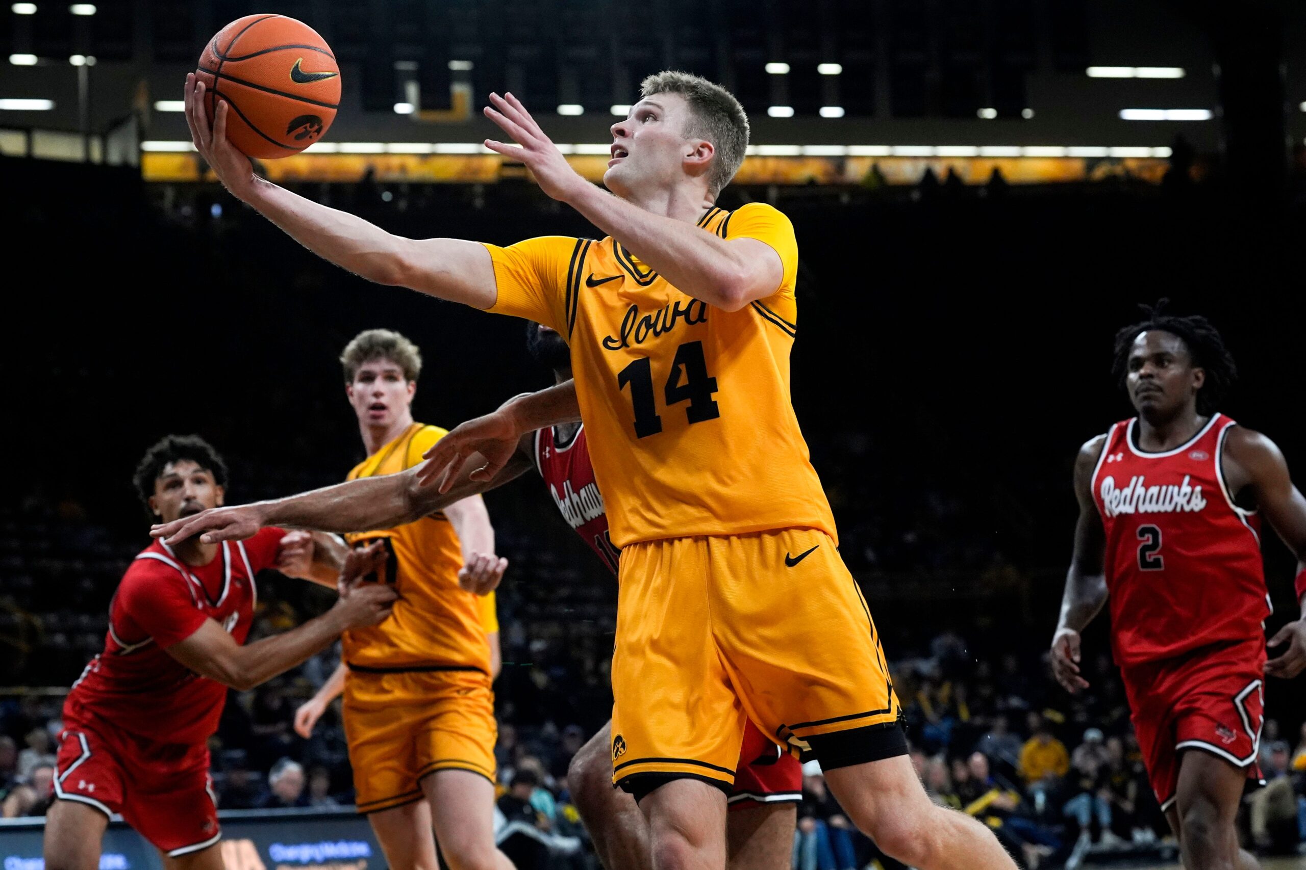 Iowa guard Bennett Stirtz (14) drives to the basket against the Southeast Missouri Red Hawks Nov. 18, 2025 at Carver-Hawkeye Arena in Iowa City, Iowa.