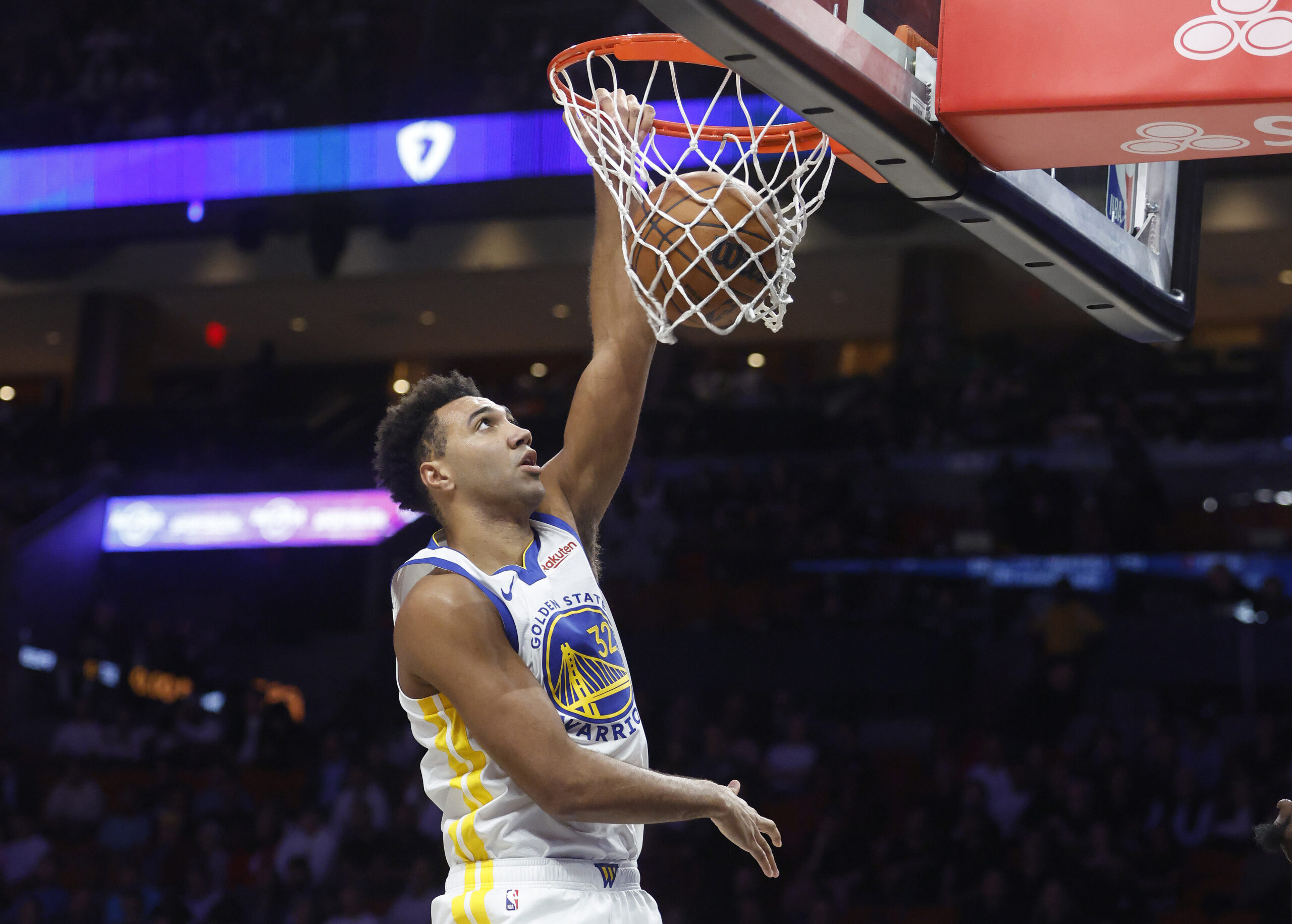 Nov 19, 2025; Miami, Florida, USA; Golden State Warriors forward Trayce Jackson-Davis (32) dunks against the Miami Heat during the first half at Kaseya Center. Mandatory Credit: Rhona Wise-Imagn Images
