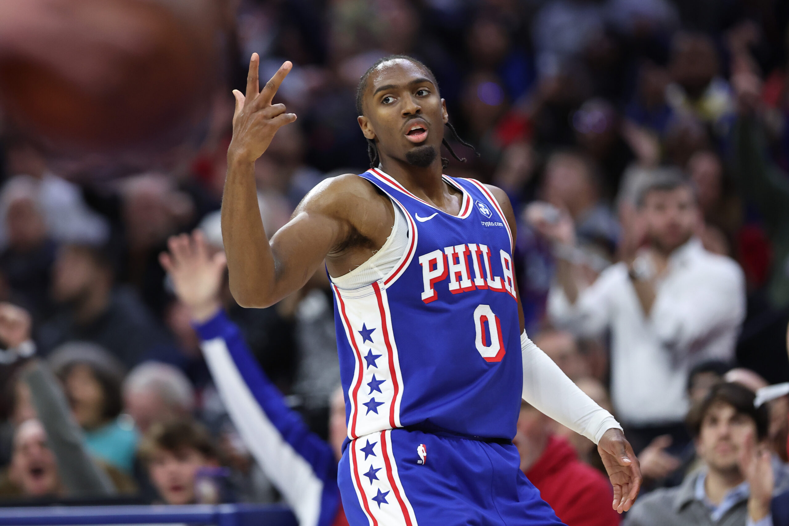 Nov 19, 2025; Philadelphia, Pennsylvania, USA; Philadelphia 76ers guard Tyrese Maxey (0) reacts to his three pointer against the Toronto Raptors during the second quarter at Xfinity Mobile Arena. Mandatory Credit: Bill Streicher-Imagn Images