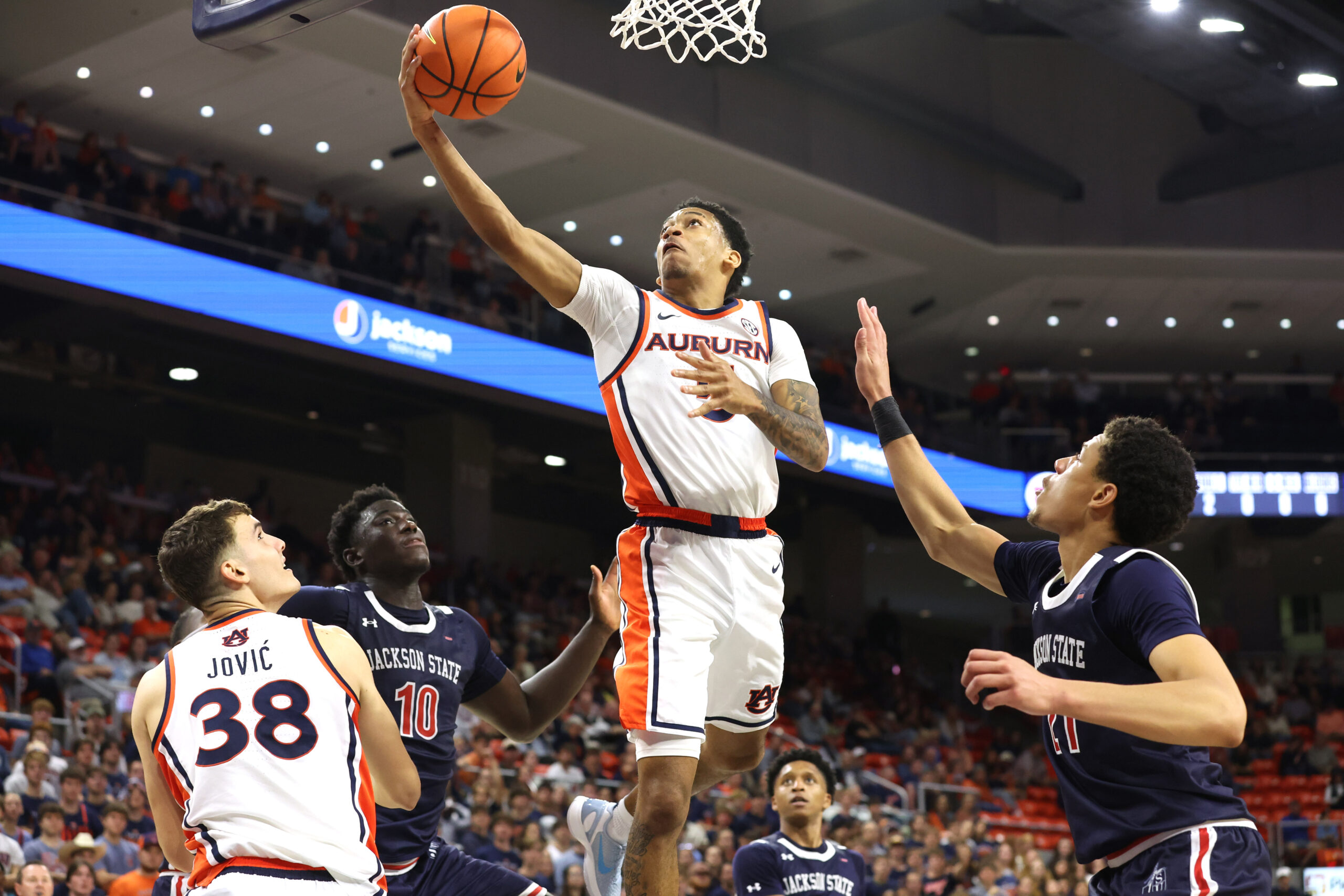 Nov 19, 2025; Auburn, Alabama, USA; Auburn Tigers guard Kaden Magwood (5) shoots the ball against the Jackson State Tigers during the second half at Neville Arena. Mandatory Credit: John Reed-Imagn Images