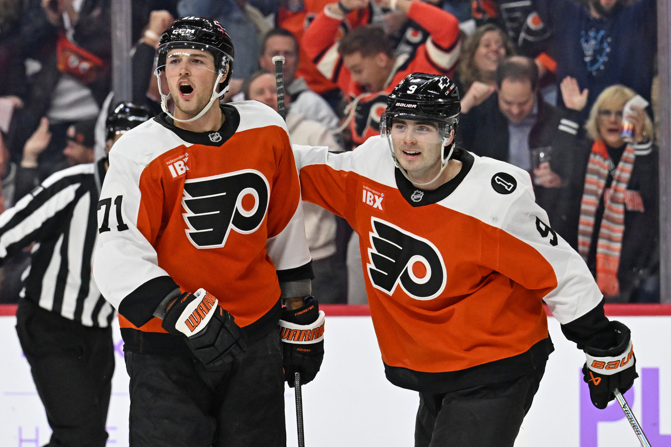 Nov 20, 2025; Philadelphia, Pennsylvania, USA; Philadelphia Flyers right wing Tyson Foerster (71) celebrates his goal with defenseman Jamie Drysdale (9) against the St. Louis Blues during the third period at Xfinity Mobile Arena. Mandatory Credit: Eric Hartline-Imagn Images
