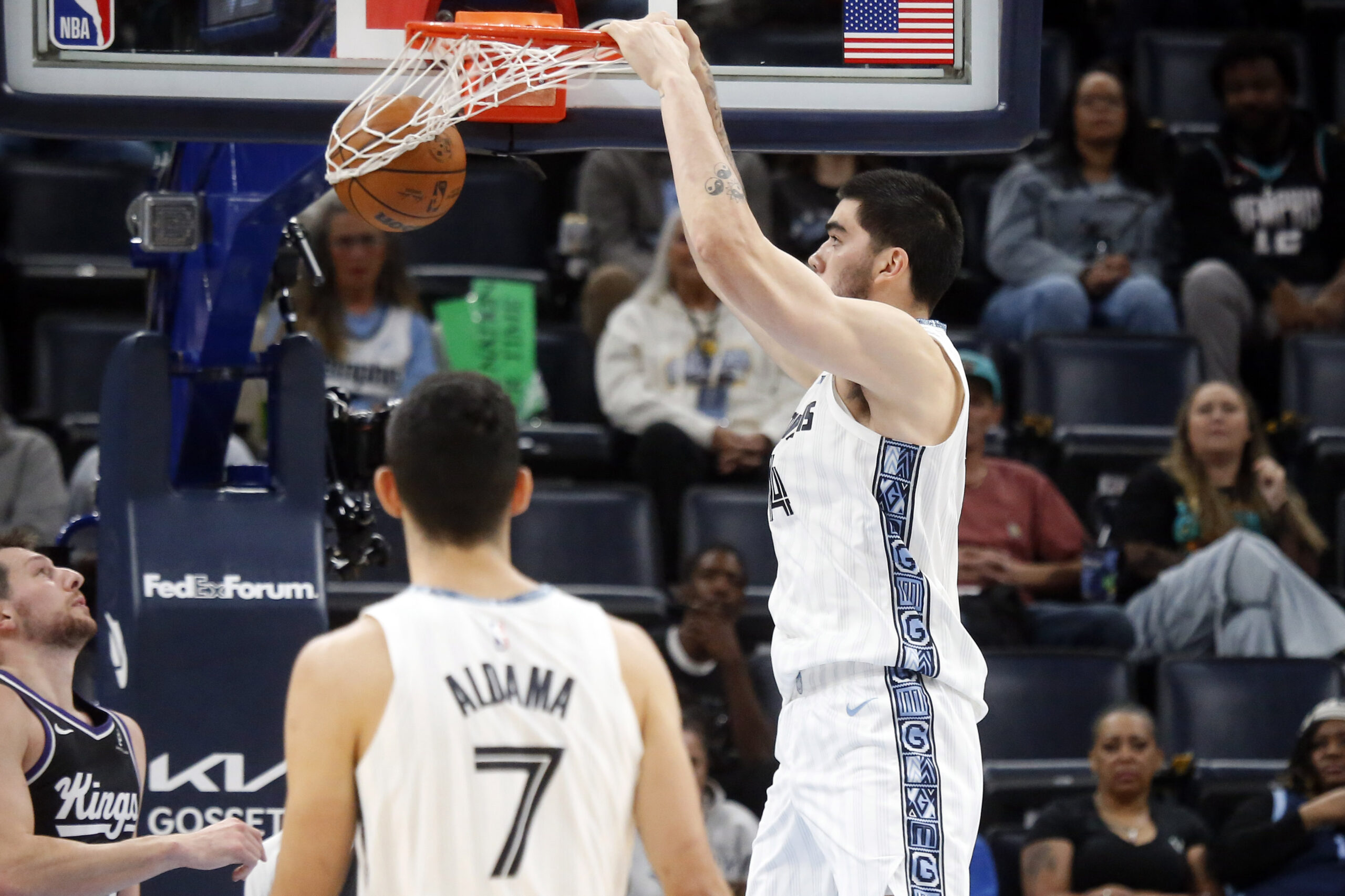 Nov 20, 2025; Memphis, Tennessee, USA; Memphis Grizzlies center Zach Edey (14) dunks during the second quarter against the Sacramento Kings at FedExForum. Mandatory Credit: Petre Thomas-Imagn Images