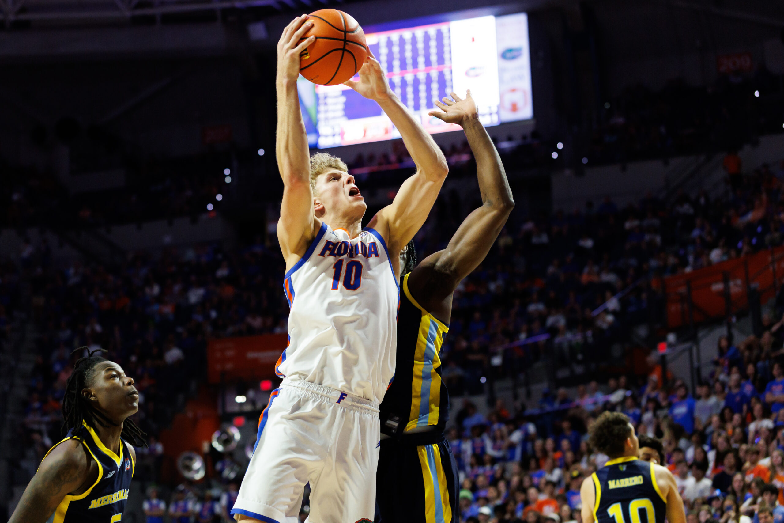 Nov 21, 2025; Gainesville, Florida, USA; Florida Gators forward Thomas Haugh (10) shoots the ball against the Merrimack Warriors during the second half at Exactech Arena at the Stephen C. O'Connell Center. Mandatory Credit: Matt Pendleton-Imagn Images