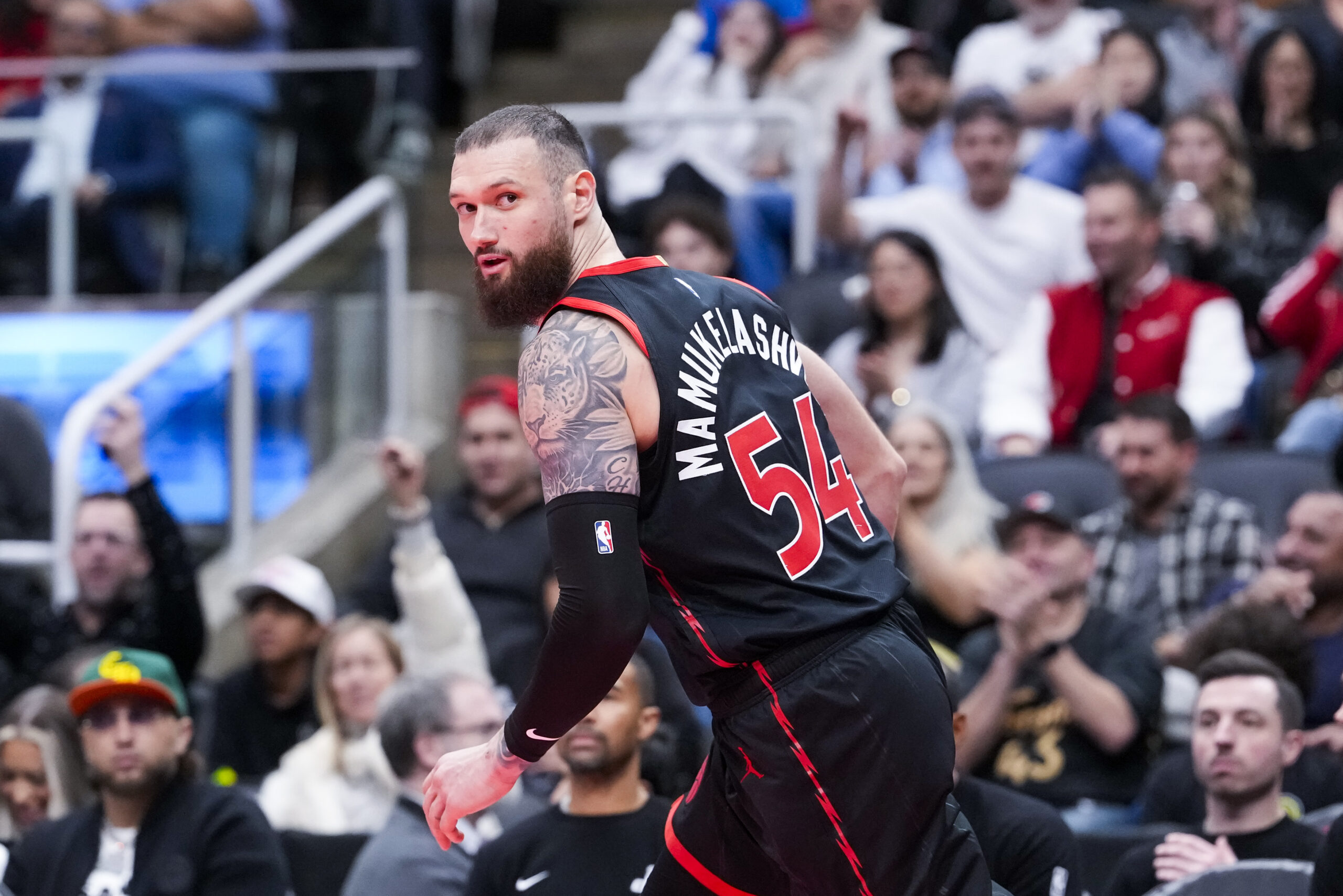 Nov 21, 2025; Toronto, Ontario, CAN;  Sandro Mamukelashvili (54) of the Toronto Raptors looks on against the Washington Wizards during the second half at Scotiabank Arena. Mandatory Credit: Kevin Sousa-Imagn Images