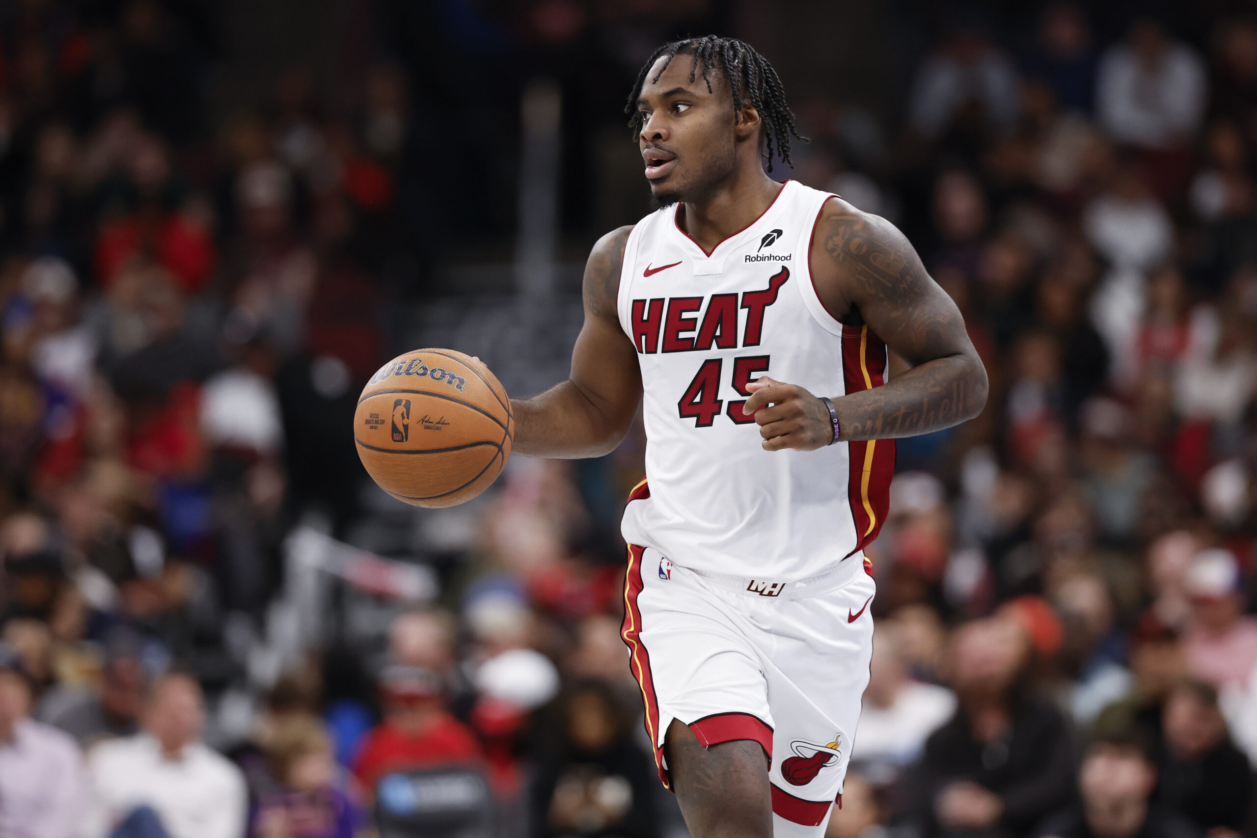 Nov 21, 2025; Chicago, Illinois, USA; Miami Heat guard Davion Mitchell (45) brings the ball up court against the Chicago Bulls during the second half at United Center. Mandatory Credit: Kamil Krzaczynski-Imagn Images