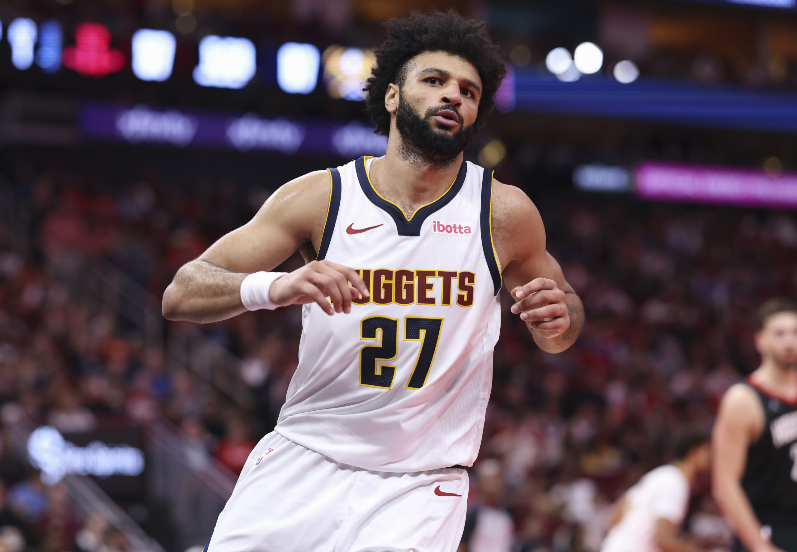 Nov 21, 2025; Houston, Texas, USA; Denver Nuggets guard Jamal Murray (27) reacts after scoring a basket during the third quarter against the Houston Rockets at Toyota Center. Mandatory Credit: Troy Taormina-Imagn Images
