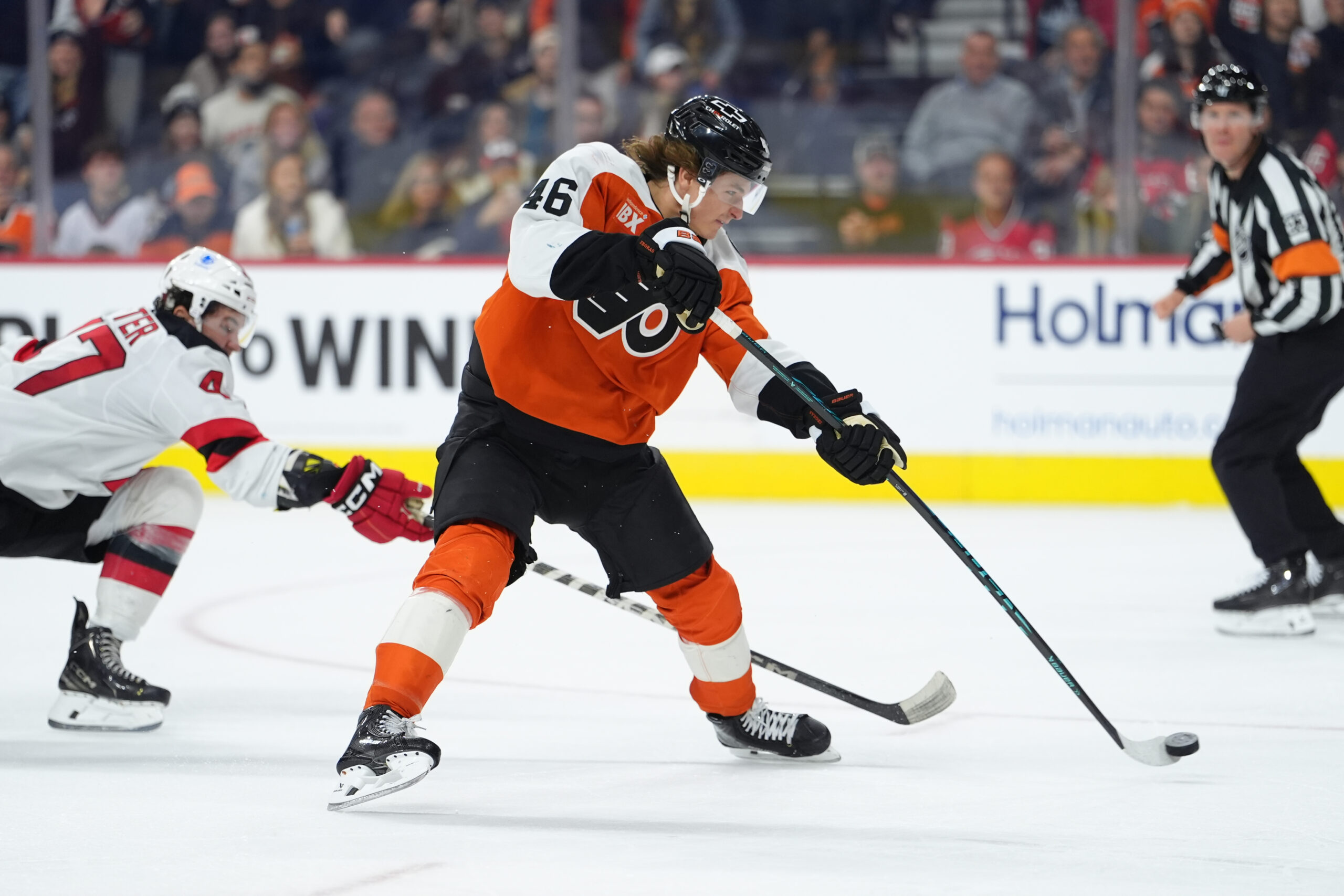Nov 22, 2025; Philadelphia, Pennsylvania, USA; Philadelphia Flyers center Trevor Zegras (46) shoots and scores a goal against the New Jersey Devils in the third period at Xfinity Mobile Arena. Mandatory Credit: Kyle Ross-Imagn Images