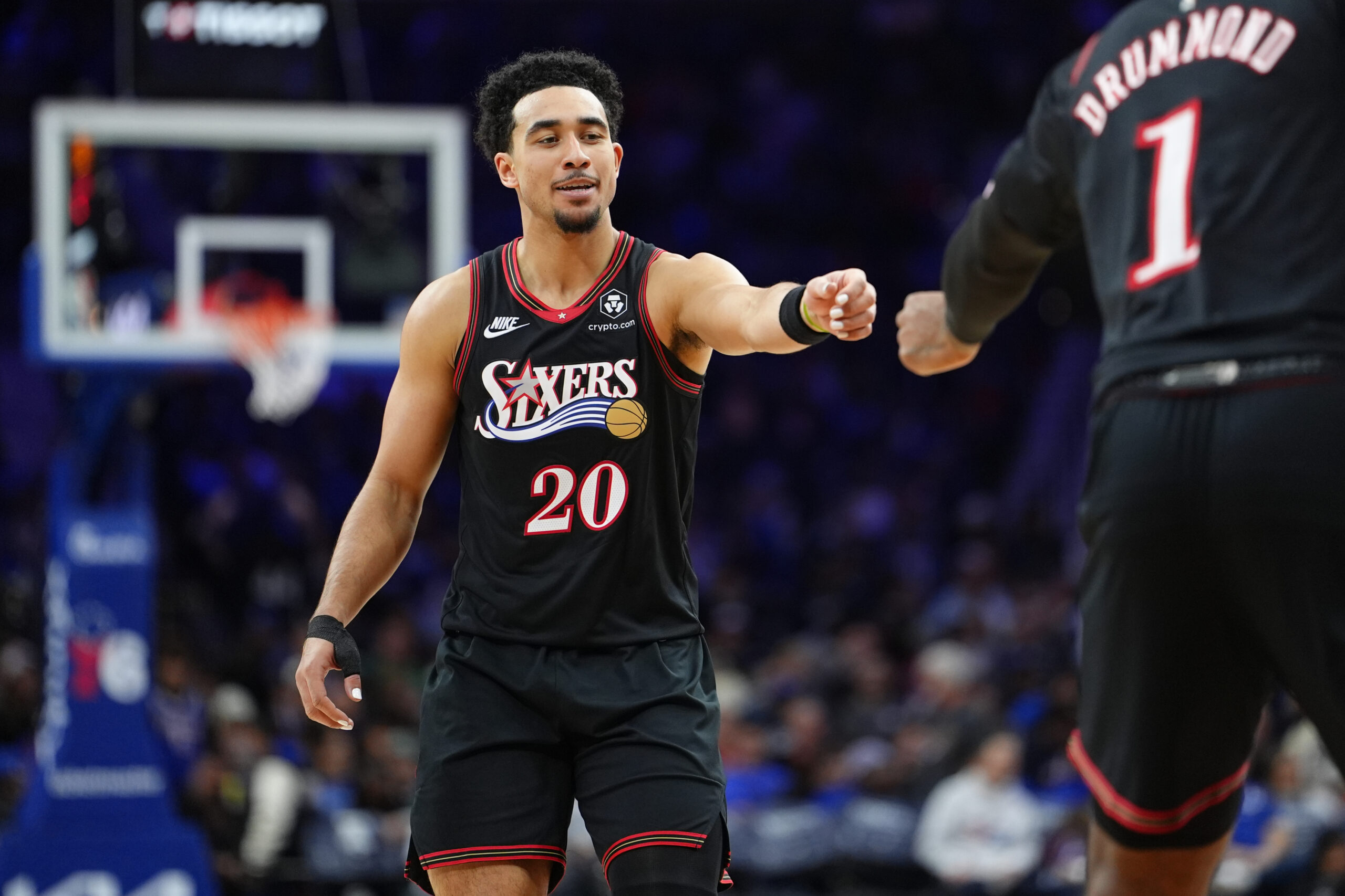 Nov 23, 2025; Philadelphia, Pennsylvania, USA; Philadelphia 76ers guard Jared McCain (20) reacts against the Miami Heat in the third quarter at Xfinity Mobile Arena. Mandatory Credit: Kyle Ross-Imagn Images