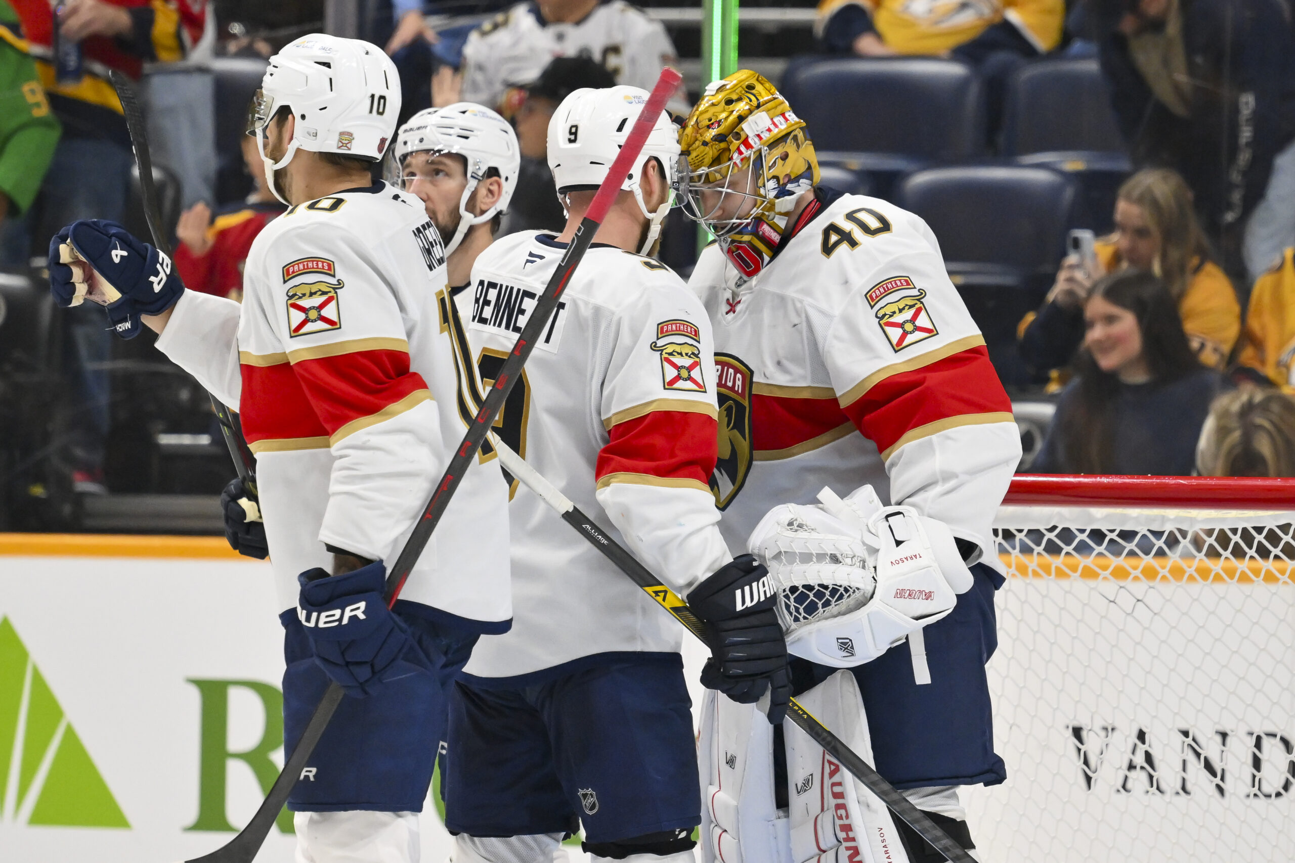 Nov 24, 2025; Nashville, Tennessee, USA;  Florida Panthers goaltender Daniil Tarasov (40) celebrates the win with his teammates against the Nashville Predators during the third period at Bridgestone Arena. Mandatory Credit: Steve Roberts-Imagn Images