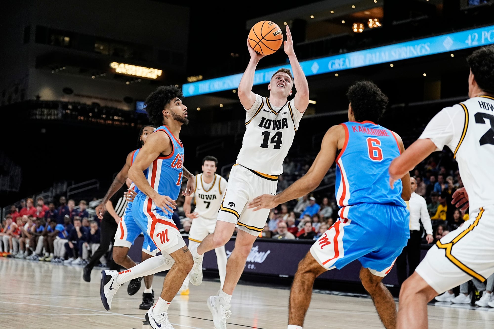 Iowa guard Bennett Stirtz (14) drives to the basket against Ole Miss at Acrisure Arena in Palm Desert, Calif., on Nov. 25, 2025.