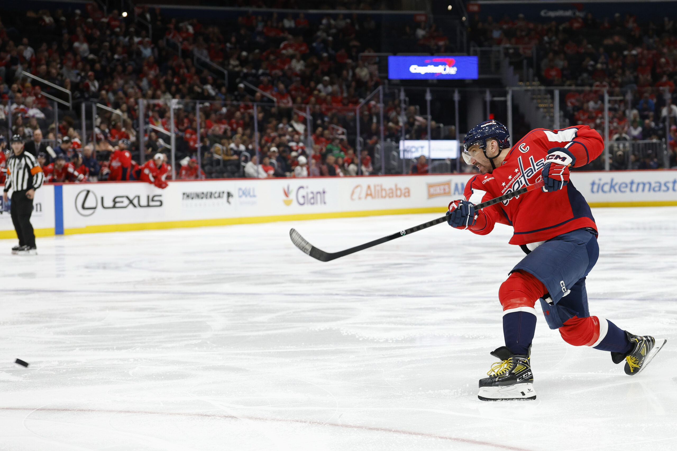Nov 26, 2025; Washington, District of Columbia, USA; Washington Capitals left wing Alex Ovechkin (8) shoots the puck against the Winnipeg Jets during the third period at Capital One Arena. Mandatory Credit: Geoff Burke-Imagn Images