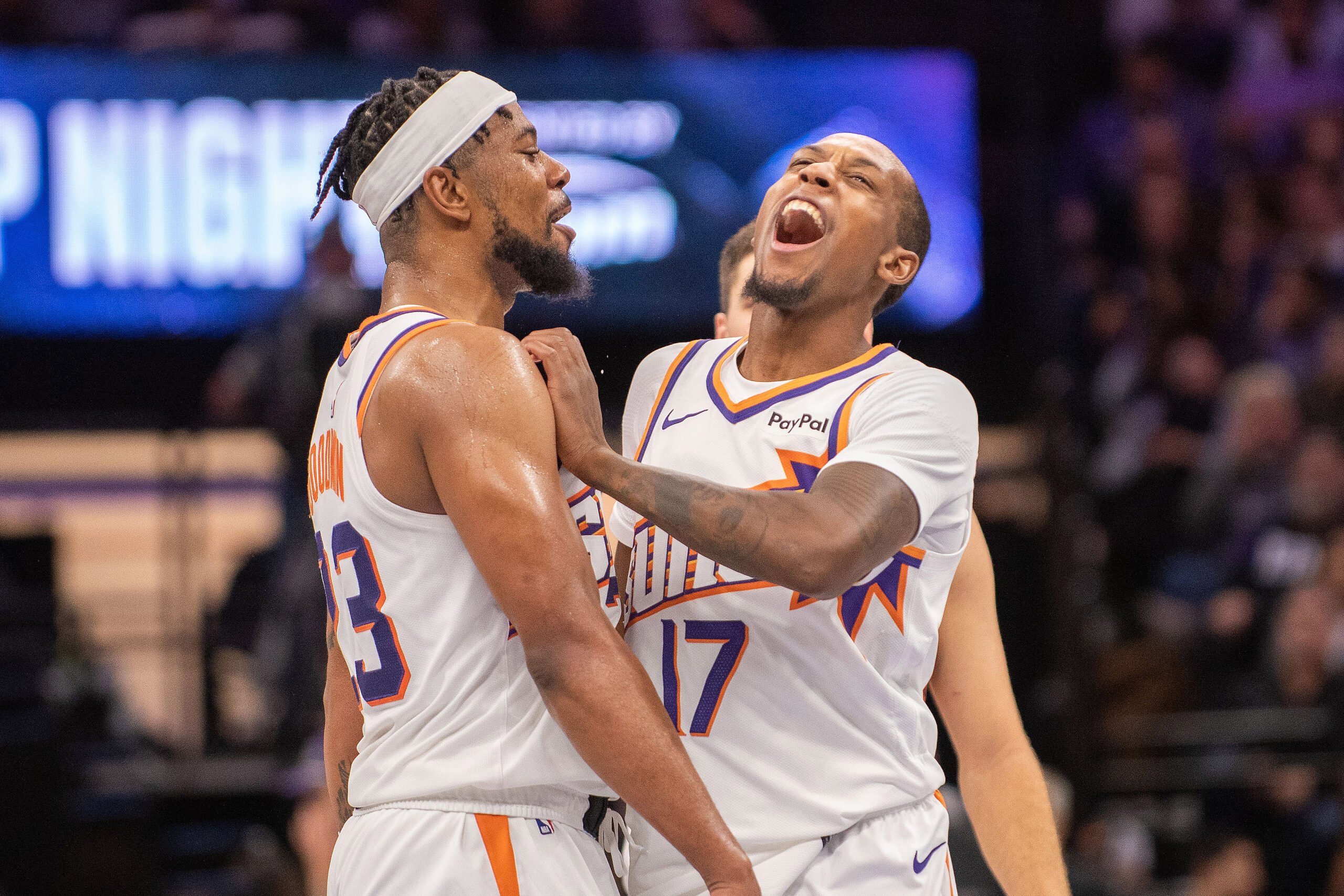 Nov 26, 2025; Sacramento, California, USA; Phoenix Suns guard Jamaree Bouyea (17) celebrates with guard Jordan Goodwin (23) after making a three point shot during the fourth quarter of the game against the Sacramento Kings at Golden 1 Center. Mandatory Credit: Ed Szczepanski-Imagn Images