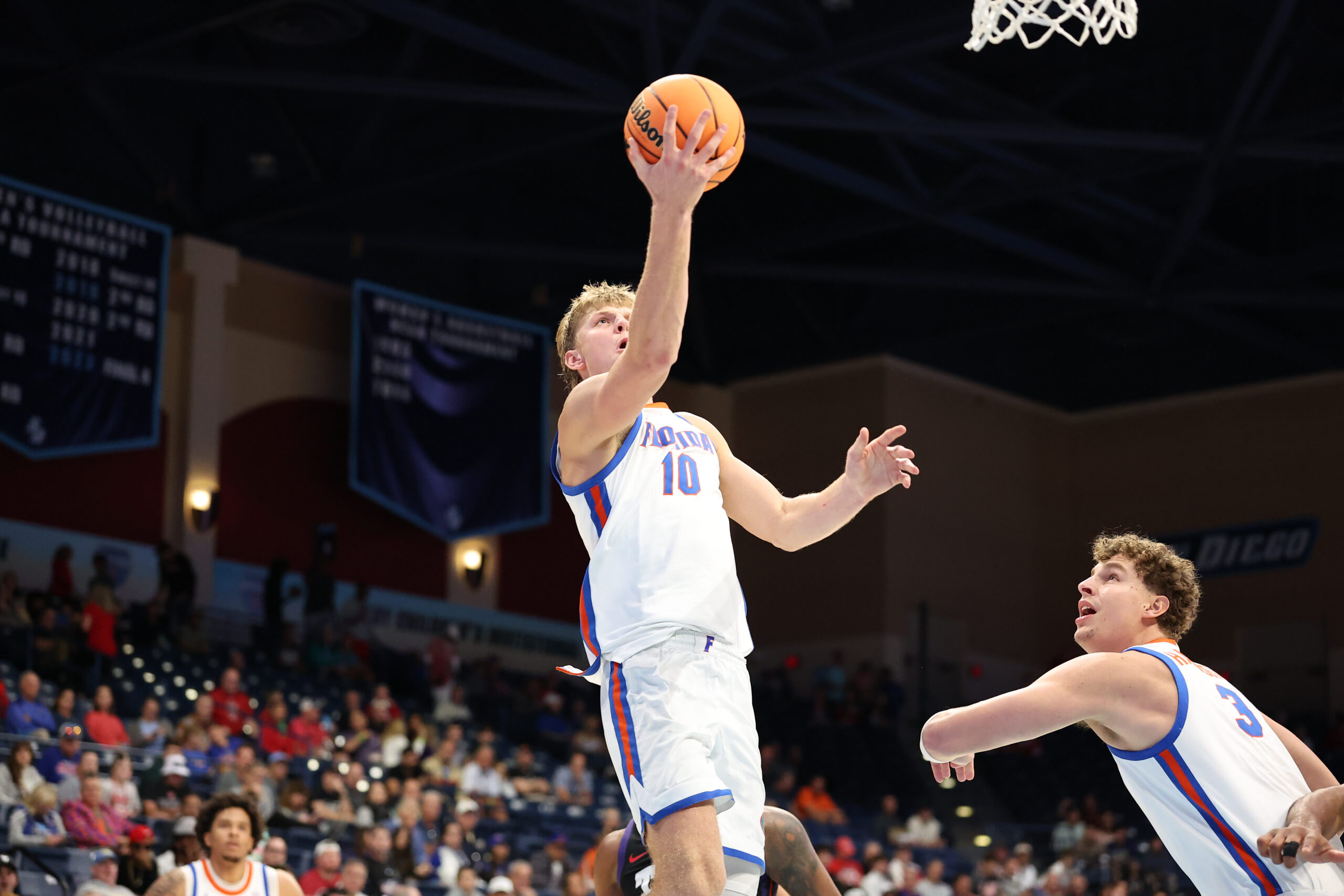 Nov 27, 2025; San Diego, California, USA; Florida Gators forward Thomas Haugh (10) shoots a layup against the Texas Christian University Horned Frogs during the second half at Jenny Craig Pavilion. Mandatory Credit: Abe Arredondo-Imagn Images
