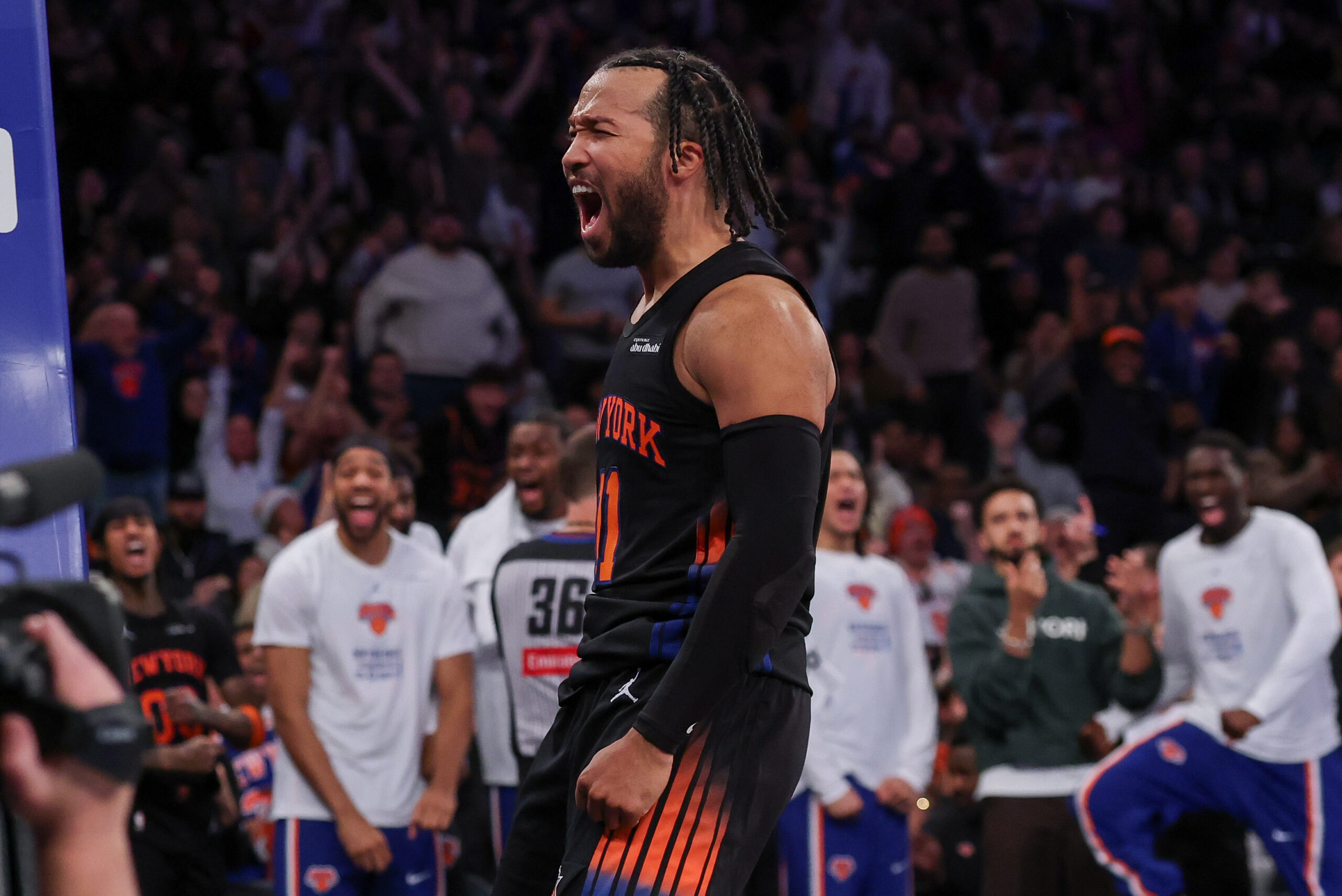 Nov 28, 2025; New York, New York, USA;  New York Knicks guard Jalen Brunson (11) reacts after making a basket during the second half against the Milwaukee Bucks at Madison Square Garden. Mandatory Credit: Vincent Carchietta-Imagn Images