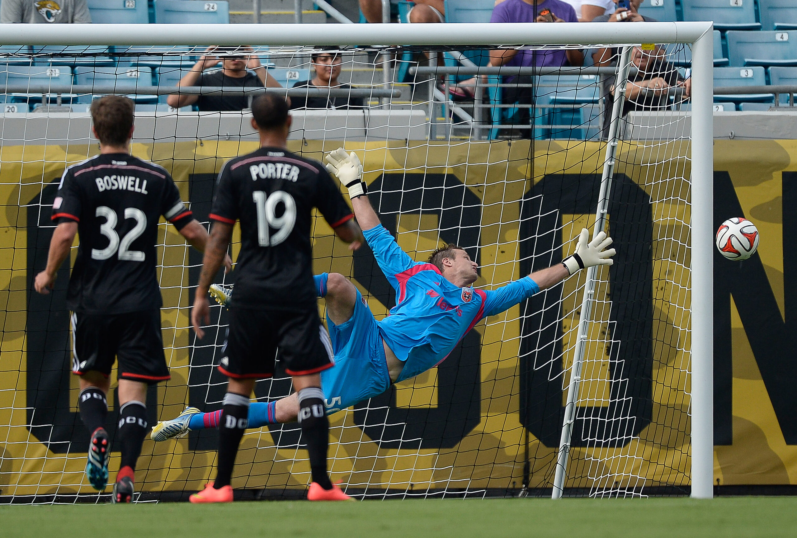 Jul 26, 2014; Jacksonville, FL, USA; D.C. United goalie Andrew Dykstra (50) makes a save against Fulham Football Club in the first half at EverBank Field. Mandatory Credit: Richard Dole-Imagn Images
