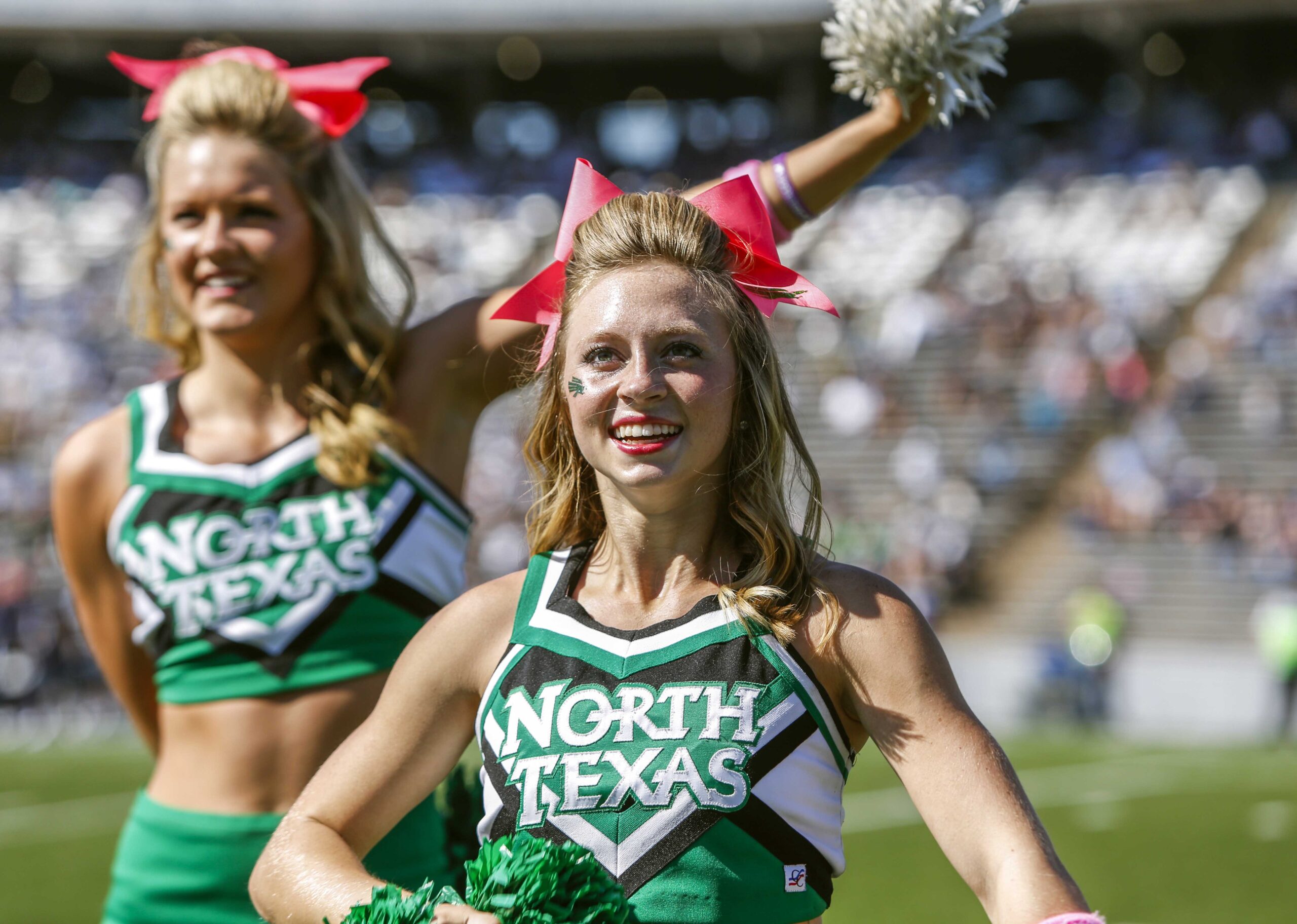 Oct 25, 2014; Houston, TX, USA; North Texas Mean Green cheerleaders perform during a game against the Rice Owls at Rice Stadium. Mandatory Credit: Troy Taormina-Imagn Images