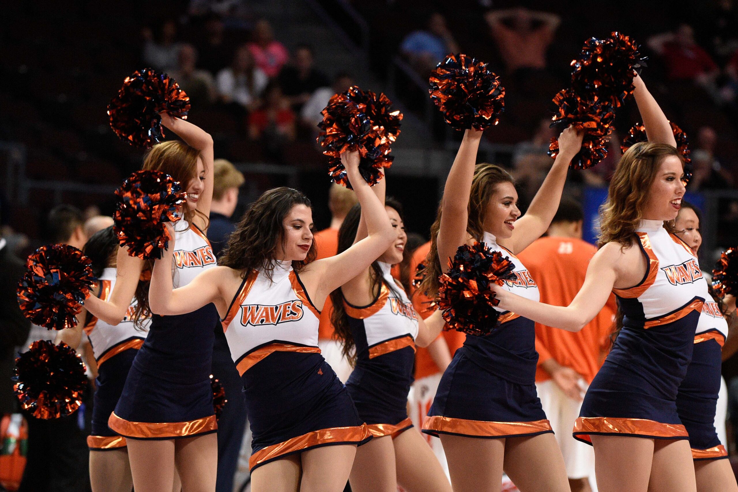 March 7, 2015; Las Vegas, NV, USA; Pepperdine Waves cheerleaders perform against the San Diego Toreros during the second half in the quarterfinals of the West Coast Conference tournament at Orleans Arena. Mandatory Credit: Kyle Terada-Imagn Images
