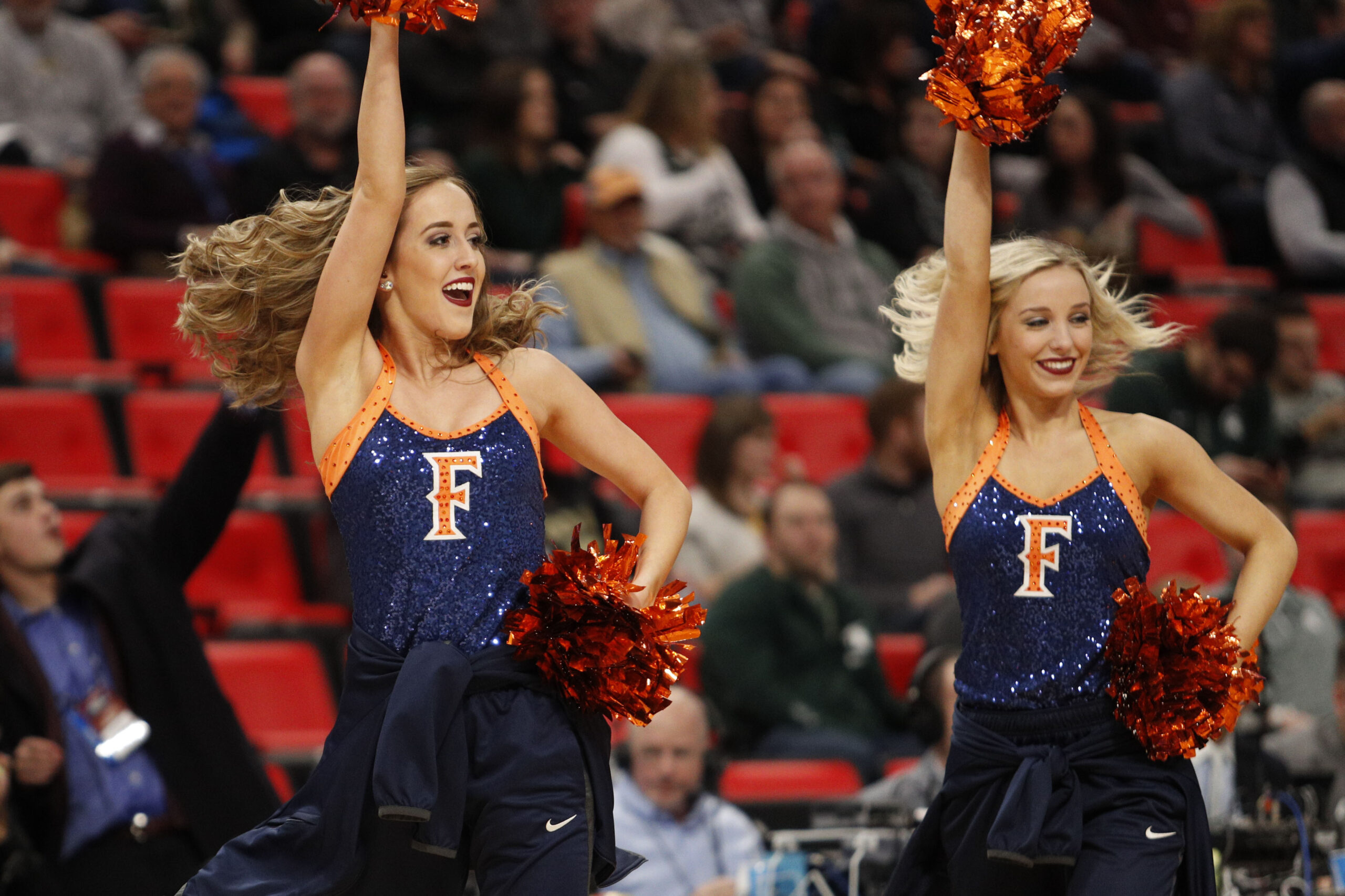 Mar 16, 2018; Detroit, MI, USA; Cal State Fullerton Titans cheerleaders in the first half in the game against the Purdue Boilermakers in the first round of the 2018 NCAA Tournament at Little Caesars Arena. Mandatory Credit: Raj Mehta-Imagn Images