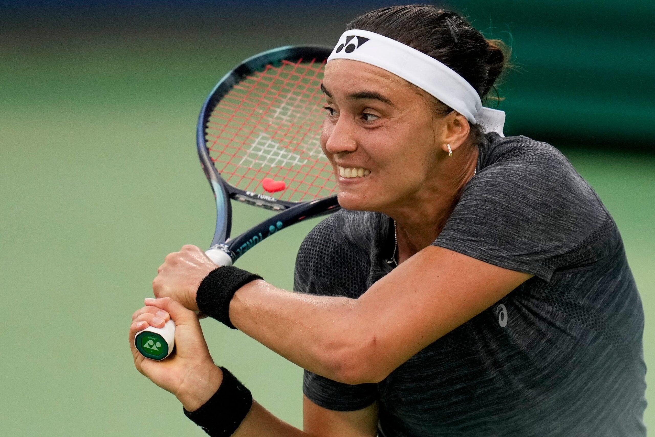 Anhelina Kalinina returns a shot in the third set of the Round of 32 match between Ons Jaebeur (TUN) and Anhelina Kalinina (Ukraine) in the Western & Southern Open at the Lindner Family Tennis Center in Mason, Ohio, on Tuesday, Aug. 15, 2023. Jaebeur won the match, 6-3, 6-7, 7-6.