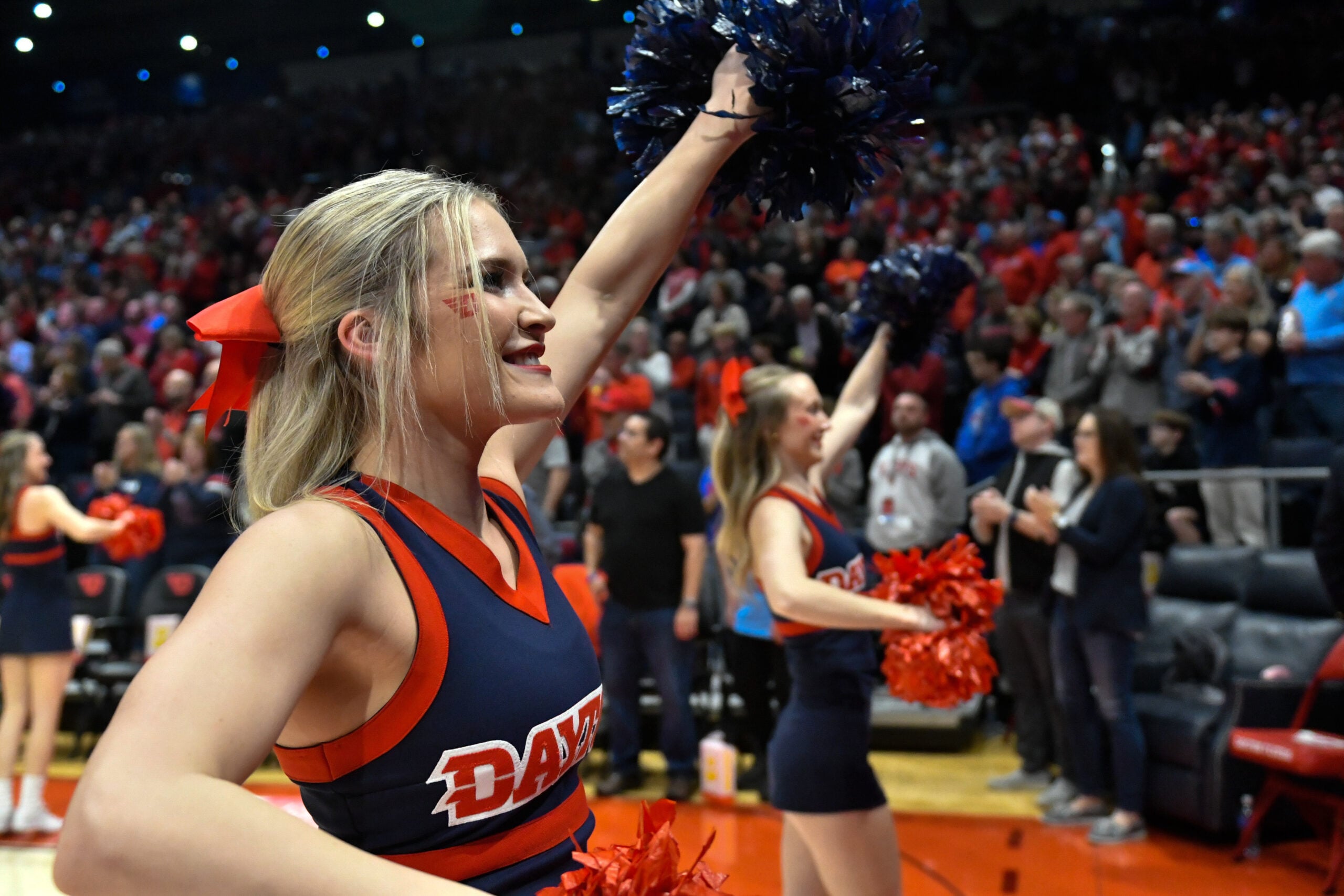 Feb 27, 2024; Dayton, Ohio, USA; The Dayton Flyers cheerleaders perform before the game against the Davidson Wildcats at University of Dayton Arena. Mandatory Credit: Matt Lunsford-Imagn Images