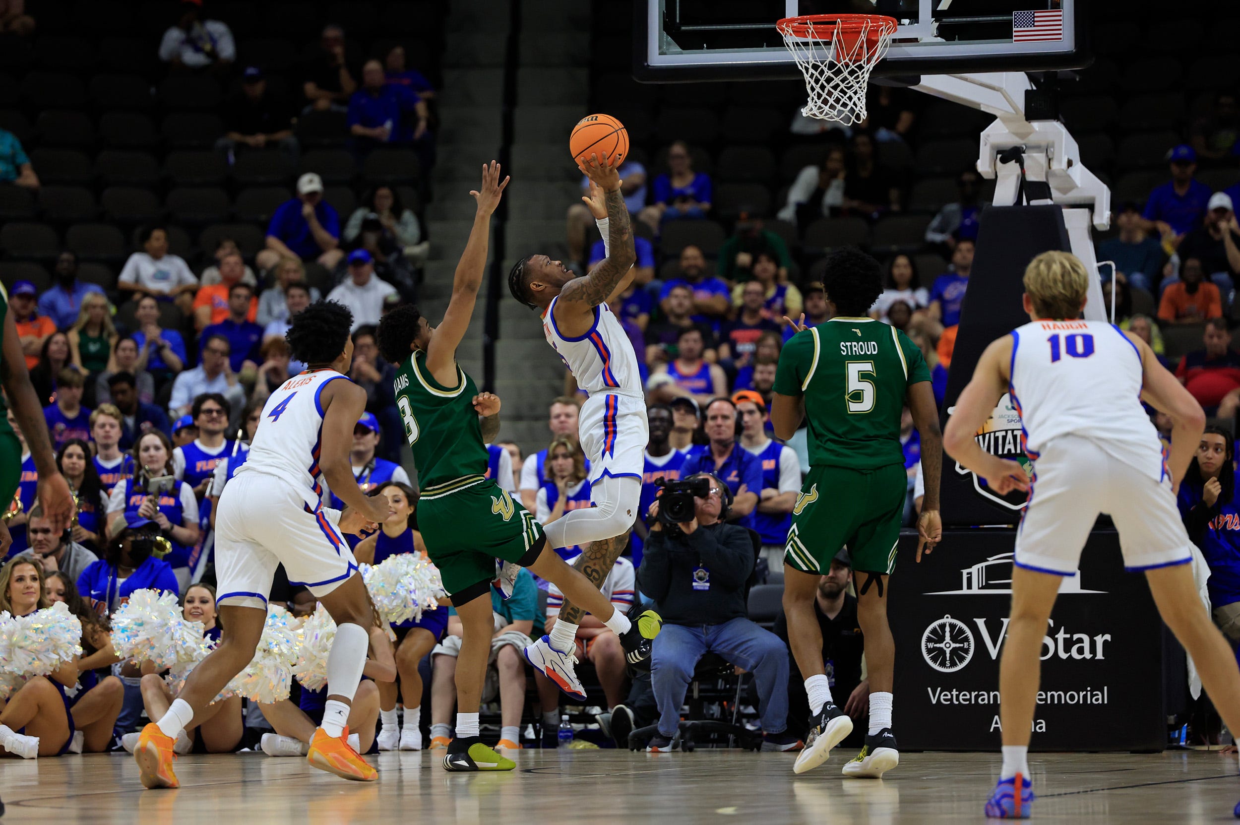 Florida Gators guard Alijah Martin (15) drives to the basket during the second half of an NCAA men’s basketball matchup Monday, Nov. 4, 2024 at VyStar Veterans Memorial Arena in Jacksonville, Fla. Florida defeated South Florida 98-83. [Corey Perrine/Florida Times-Union]