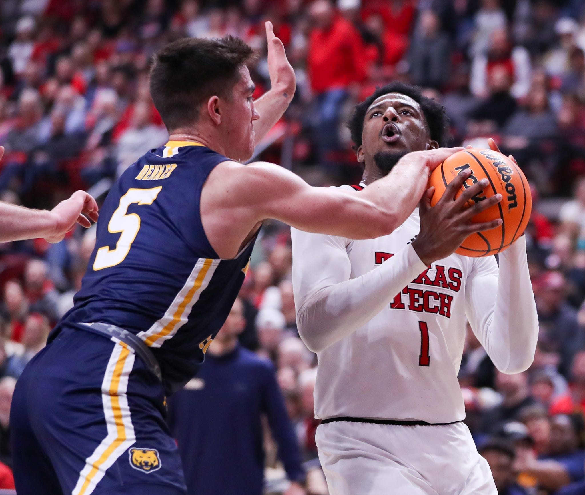 Texas Tech's Kevin Overton is defended by Northern Colorado's Quinn Denker during a non-conference basketball game, Friday, Nov. 29, 2024, at United Supermarkets Arena.