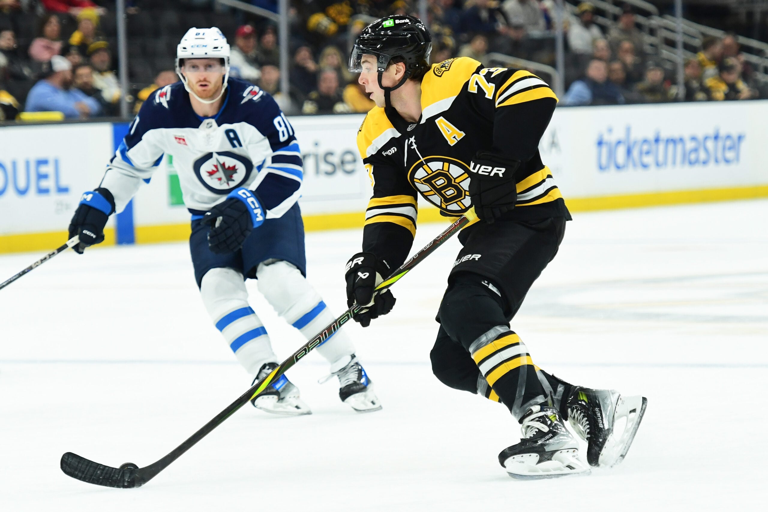 Jan 30, 2025; Boston, Massachusetts, USA; Boston Bruins defenseman Charlie McAvoy (73) skates with the puck during the third period against the Winnipeg Jets at TD Garden. Mandatory Credit: Bob DeChiara-Imagn Images