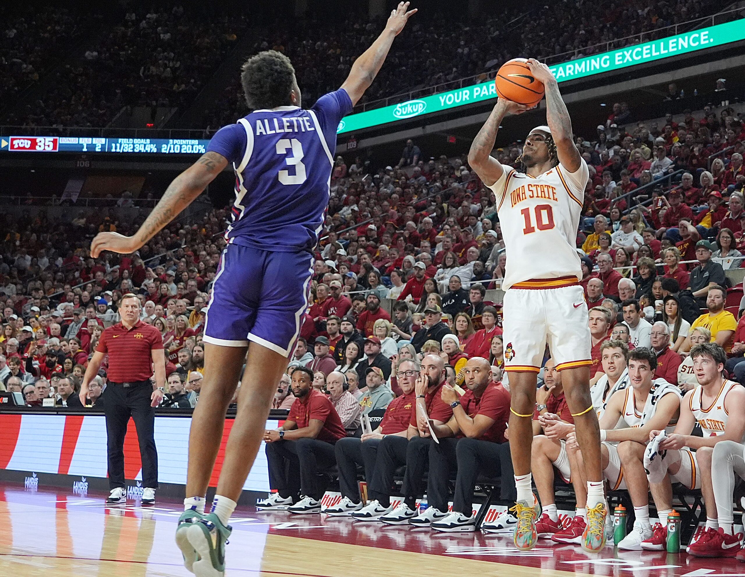 Iowa State Cyclones guard Keshon Gilbert (10) takes a three-point shot over TCU Horned Frogs Guard Vasean Allette (3) during the second half in the Big-12 men’s basketball at Hilton Coliseum on Feb 8, 2025 in Ames, Iowa.