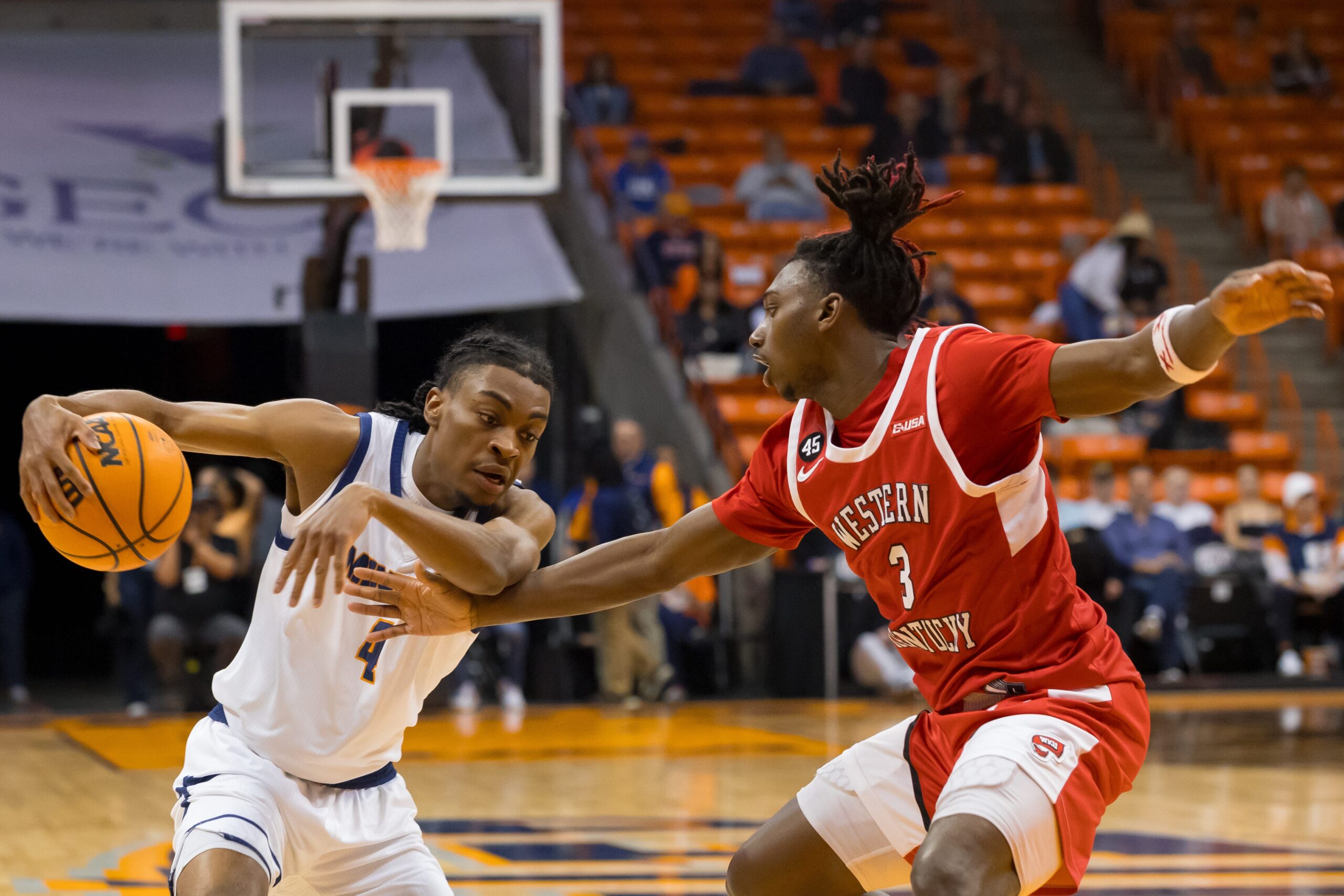 UTEP’s Corey Camper Jr. (4) dribbles the ball during a men's basketball game against Western Kentucky on Thursday, Feb. 27, 2025, at the Don Haskins Center in El Paso, Texas.