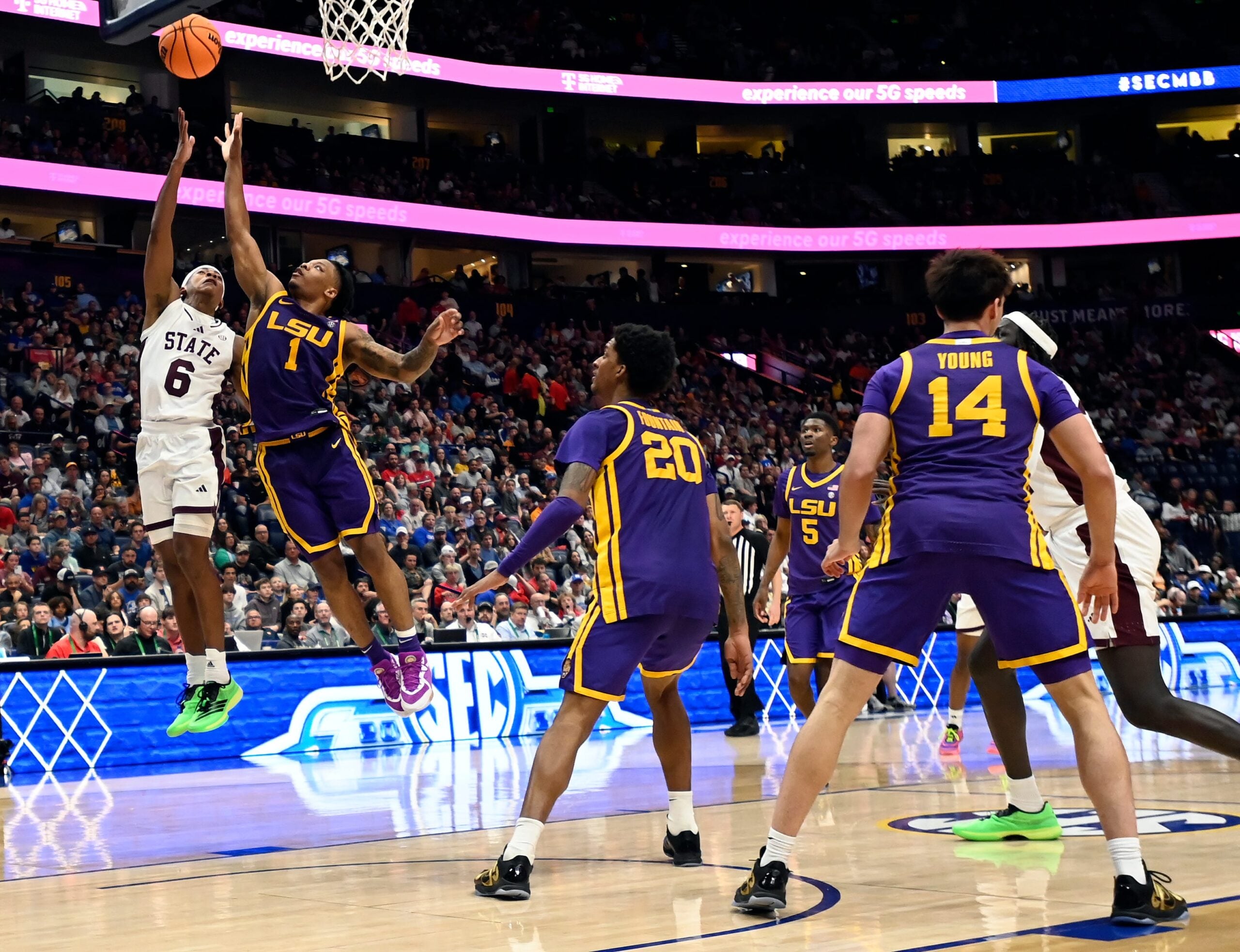 Mississippi State guard Dellquan Warren (6) shoots again LSU guard Jordan Sears (1) during a NCAA college basketball first round game at the men’s Southeastern Conference Tournament Wednesday, March 12, 2025, in Nashville, Tenn.