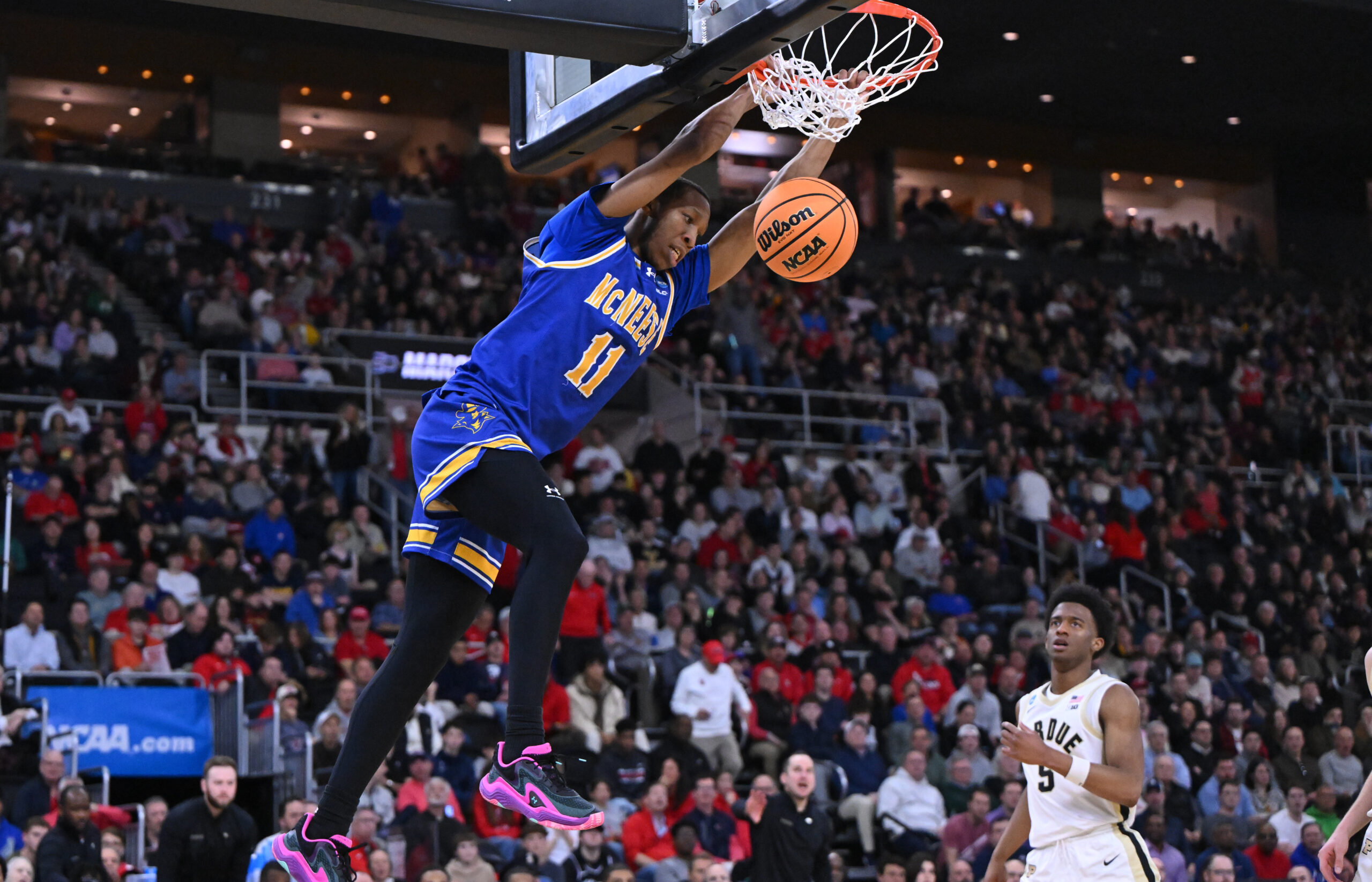 Mar 22, 2025; Providence, RI, USA; McNeese State Cowboys guard Quadir Copeland (11) dunks during the second half of a second round men’s NCAA Tournament game against the Purdue Boilermakers at Amica Mutual Pavilion. Mandatory Credit: Brian Fluharty-Imagn Images