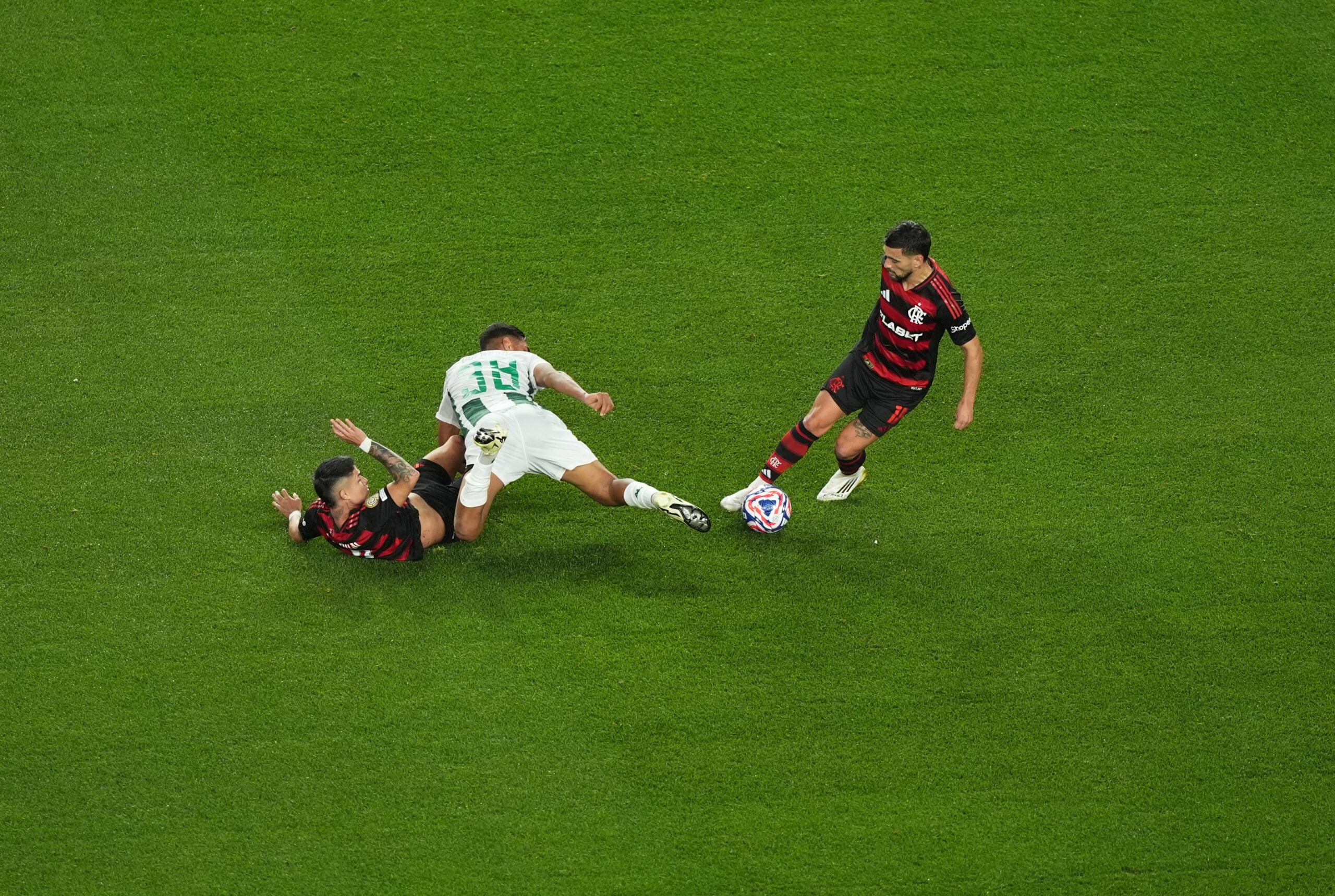 Jun 16, 2025; Philadelphia, Pennsylvania, USA; Esperance Sportive De Tunisie midfielder Khalil Guenichi (38), CR Flamengo forward Luiz Araujo (7) and forward Everton (11) battle for control of the ball during the first half in a group stage match of the 2025 FIFA Club World Cup at Lincoln Financial Field. Mandatory Credit: Kyle Ross-Imagn Images
