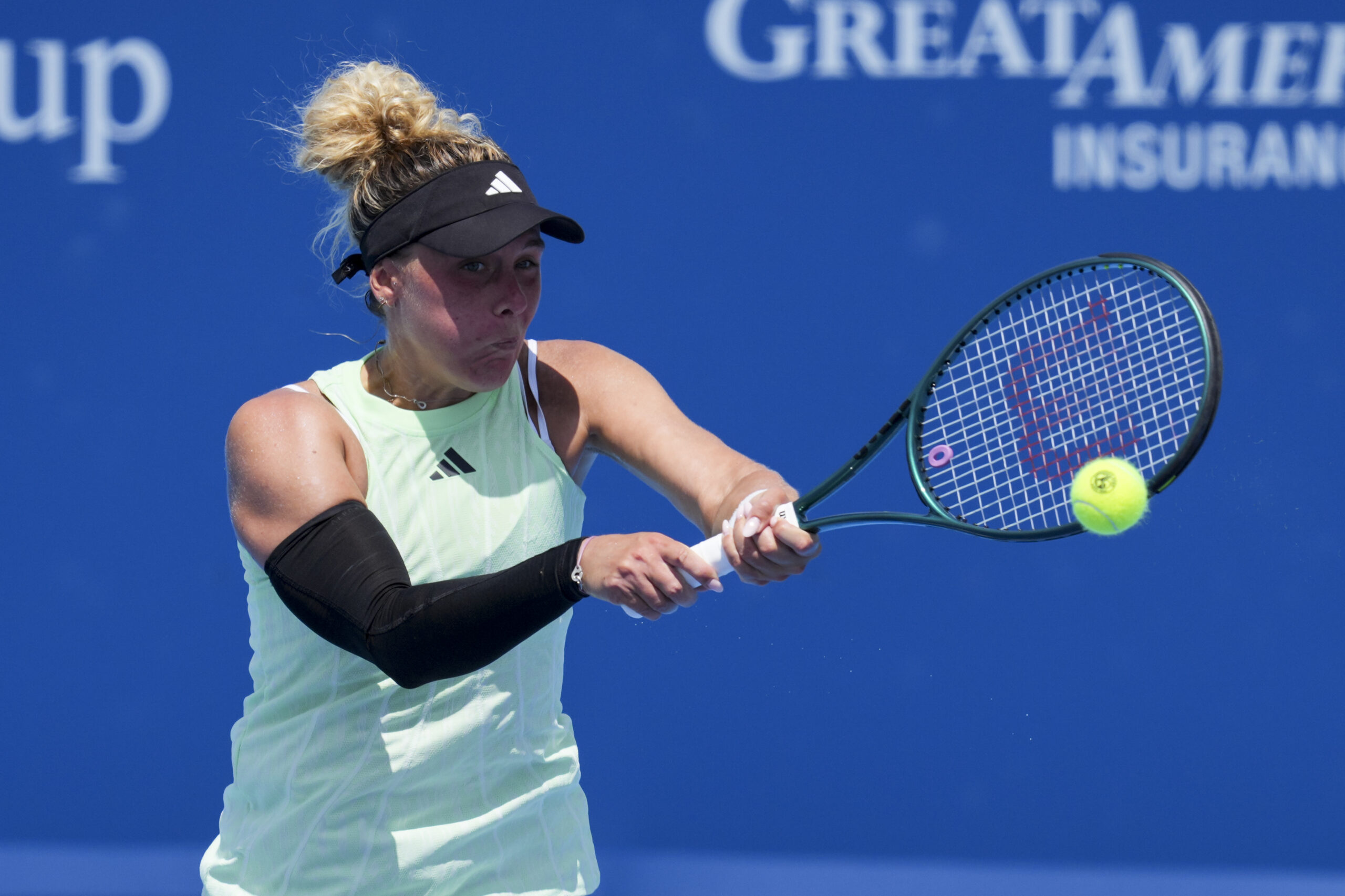 Aug 6, 2025; Cincinnati, OH, USA; Leolia Jeanjean (FRA) returns a shot against Carol Zhao (CAN) during the Cincinnati Open at the Lindner Family Tennis Center. Mandatory Credit: Aaron Doster-Imagn Images