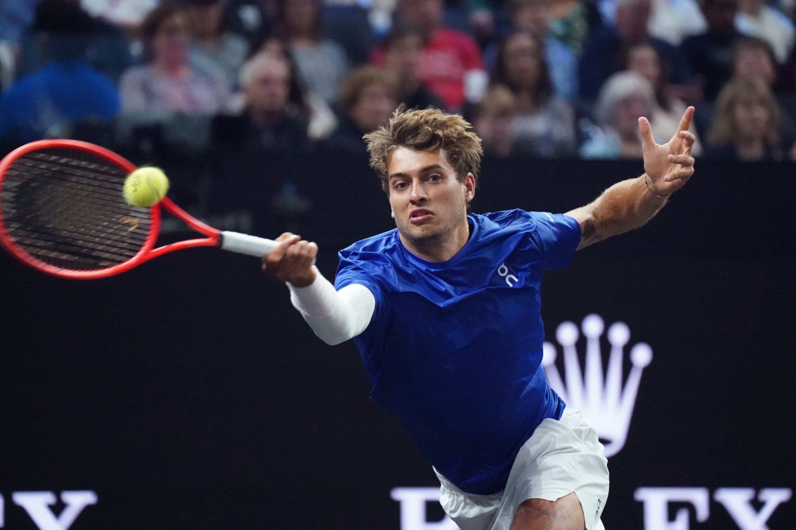 Sep 19, 2025; San Francisco, CA, USA; Team Europe player Flavio Cobolli hits a forehand against Team World player Joao Fonseca during match three of the Laver Cup at Chase Center. Mandatory Credit: David Gonzales-Imagn Images