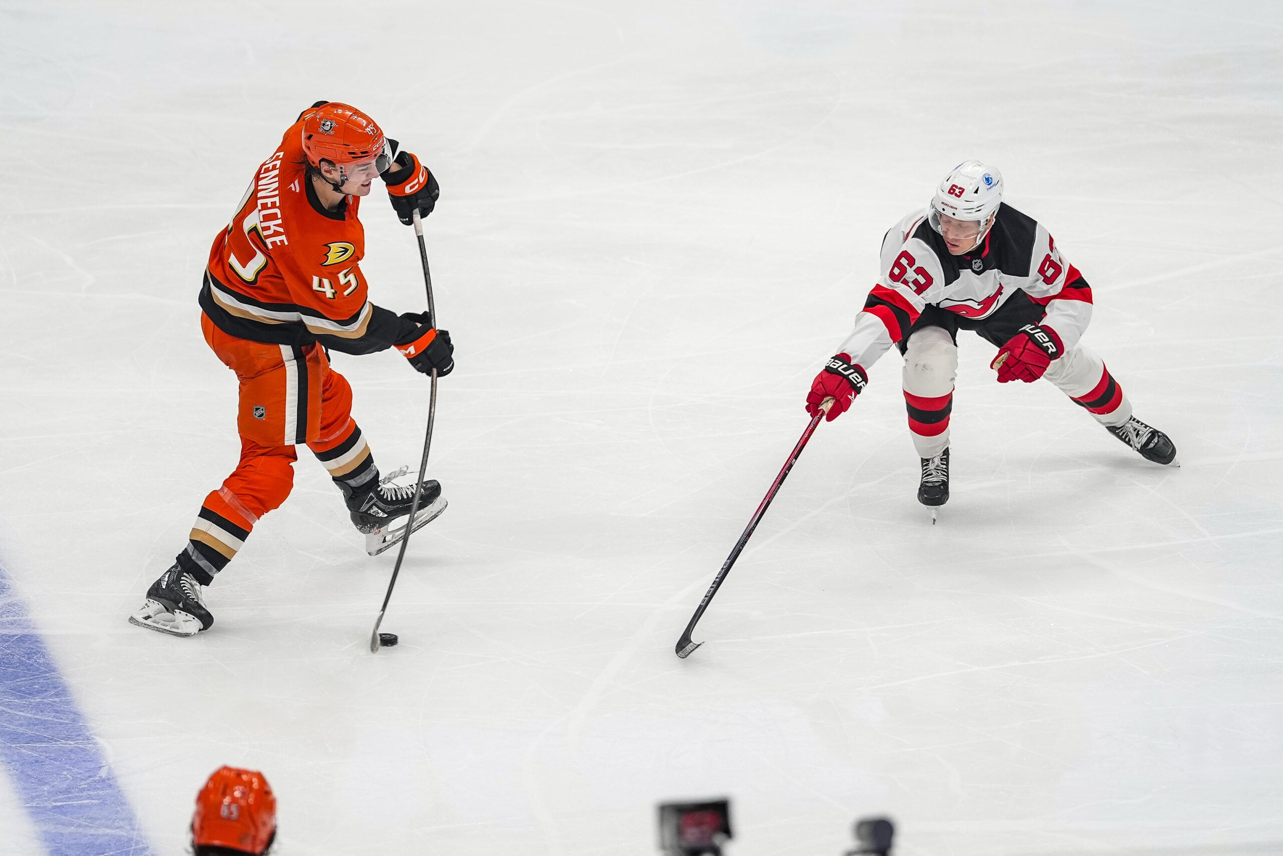 Nov 2, 2025; Anaheim, California, USA; Anaheim Ducks right wing Beckett Sennecke (45) shoots the puck during the third period at Honda Center. Mandatory Credit: Corinne Votaw-Imagn Images