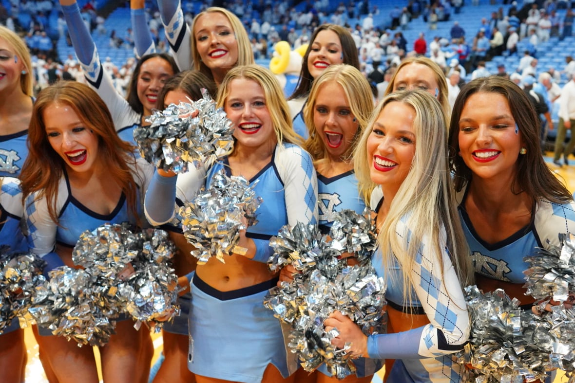 Nov 7, 2025; Chapel Hill, North Carolina, USA; North Carolina Tar Heels cheerleaders celebrate after the game at Dean E. Smith Center. Mandatory Credit: Bob Donnan-Imagn Images