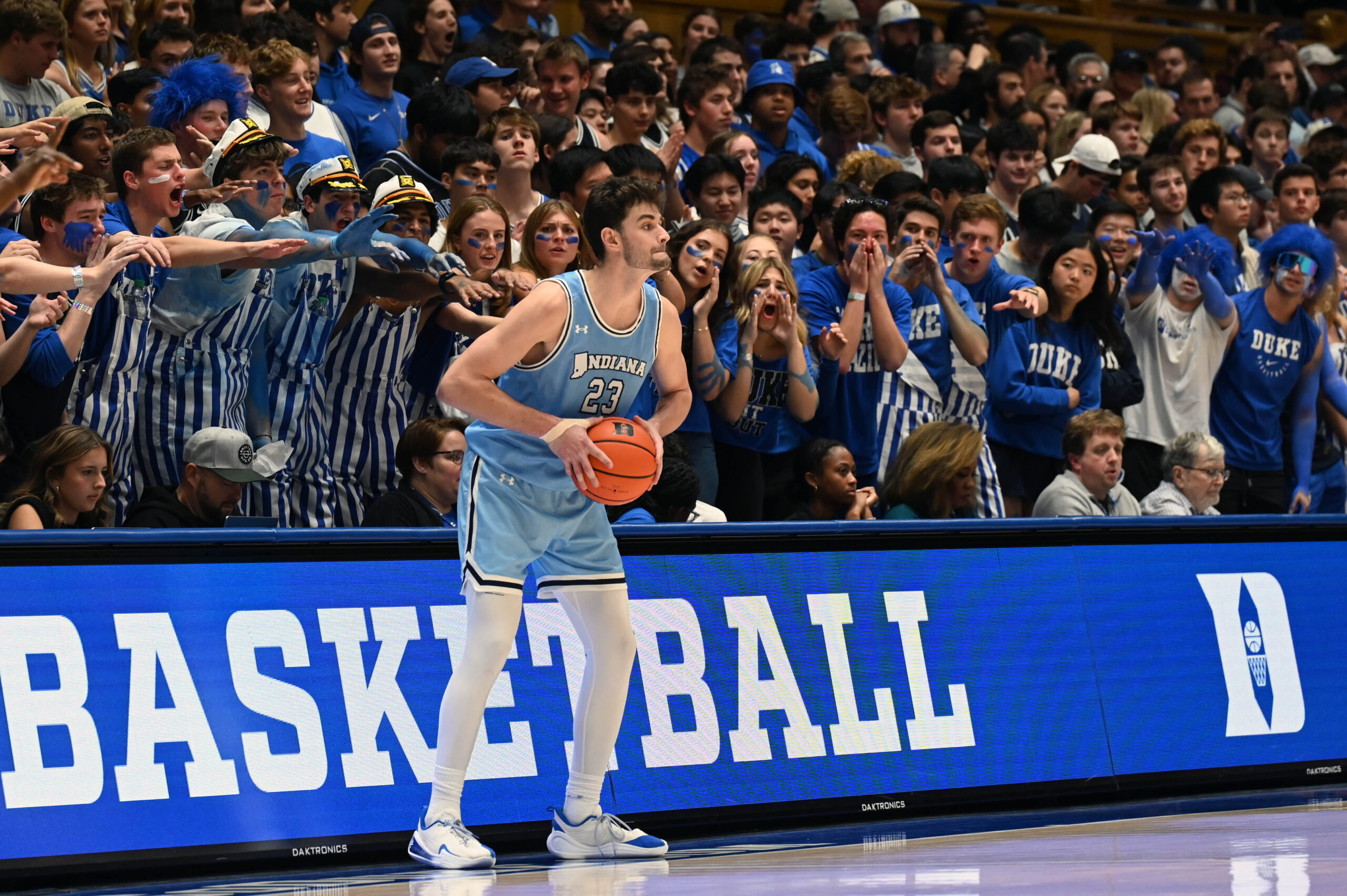 Nov 14, 2025; Durham, North Carolina, USA; Indiana State Sycamores forward Ian Scott (23) is harassed by Duke Blue Devils fans while trying to inbound the ball during the second half at Cameron Indoor Stadium. Mandatory Credit: Rob Kinnan-Imagn Images