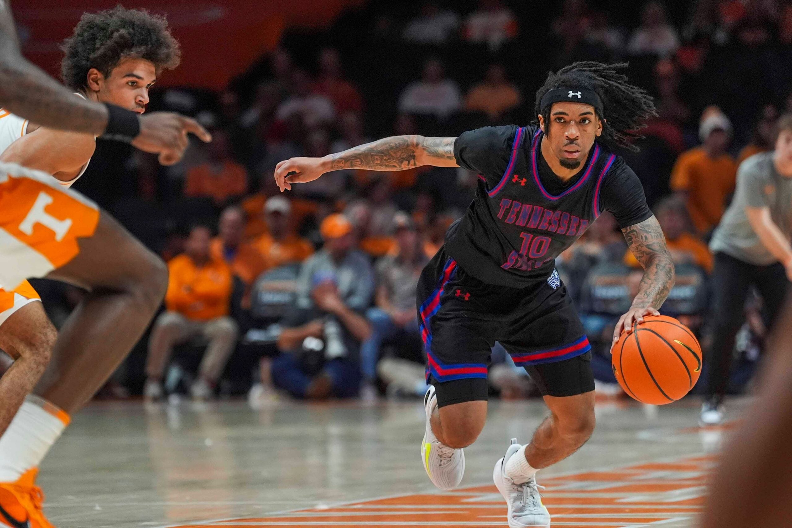 Tennessee State guard Dante Harris (10) dribbles the ball during a NCAA basketball game between the Tennessee Volunteers and Tennessee State Tigers at Thompson-Boling Arena at Food City Center in Knoxville, Tenn., on Nov. 20, 2025.