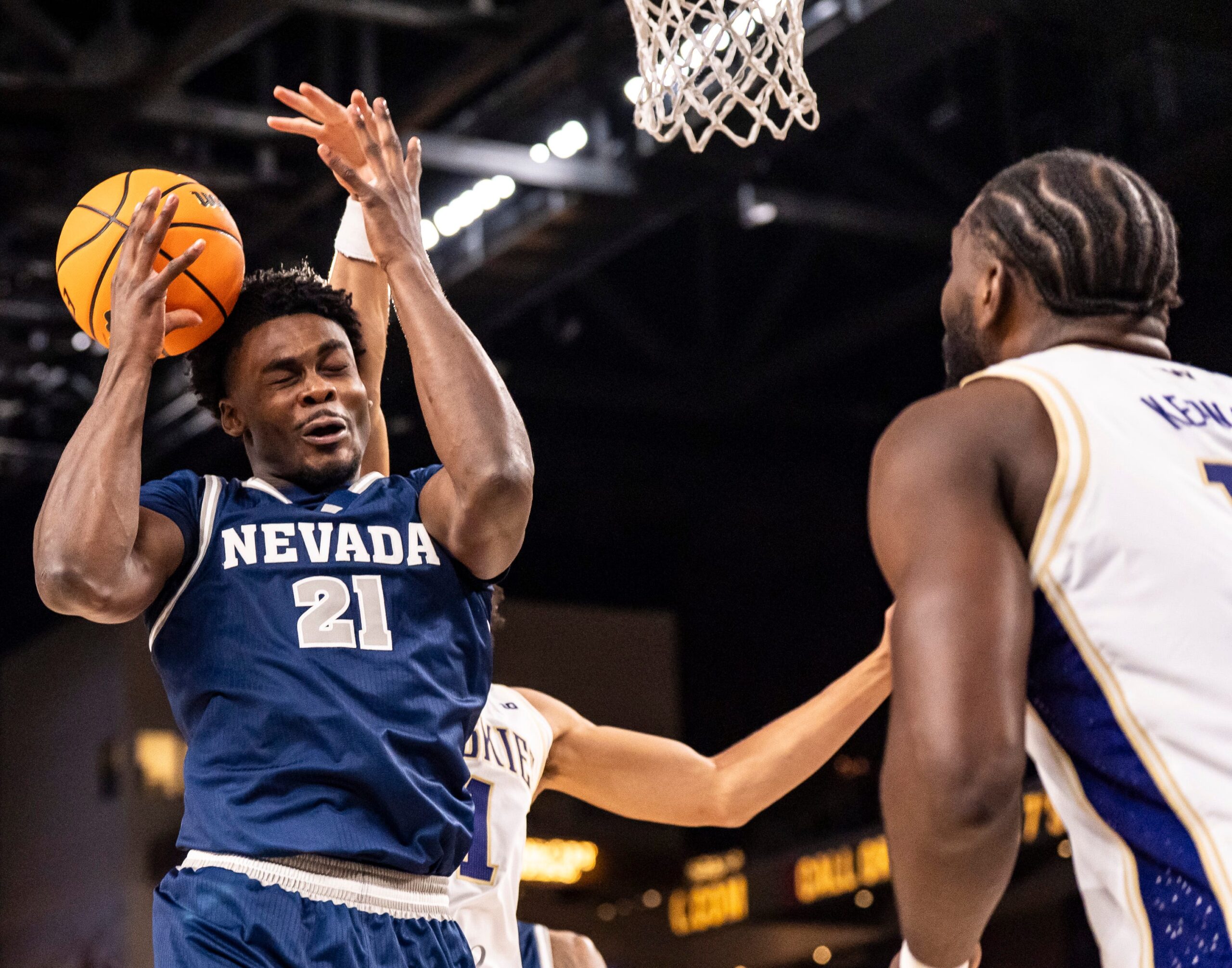 Nevada Wolf Pack center Joel Armotrading (21) loses control of a rebound during the first half of their game in the Acrisure Series in Palm Desert, Calif., Thursday, Nov. 27, 2025.