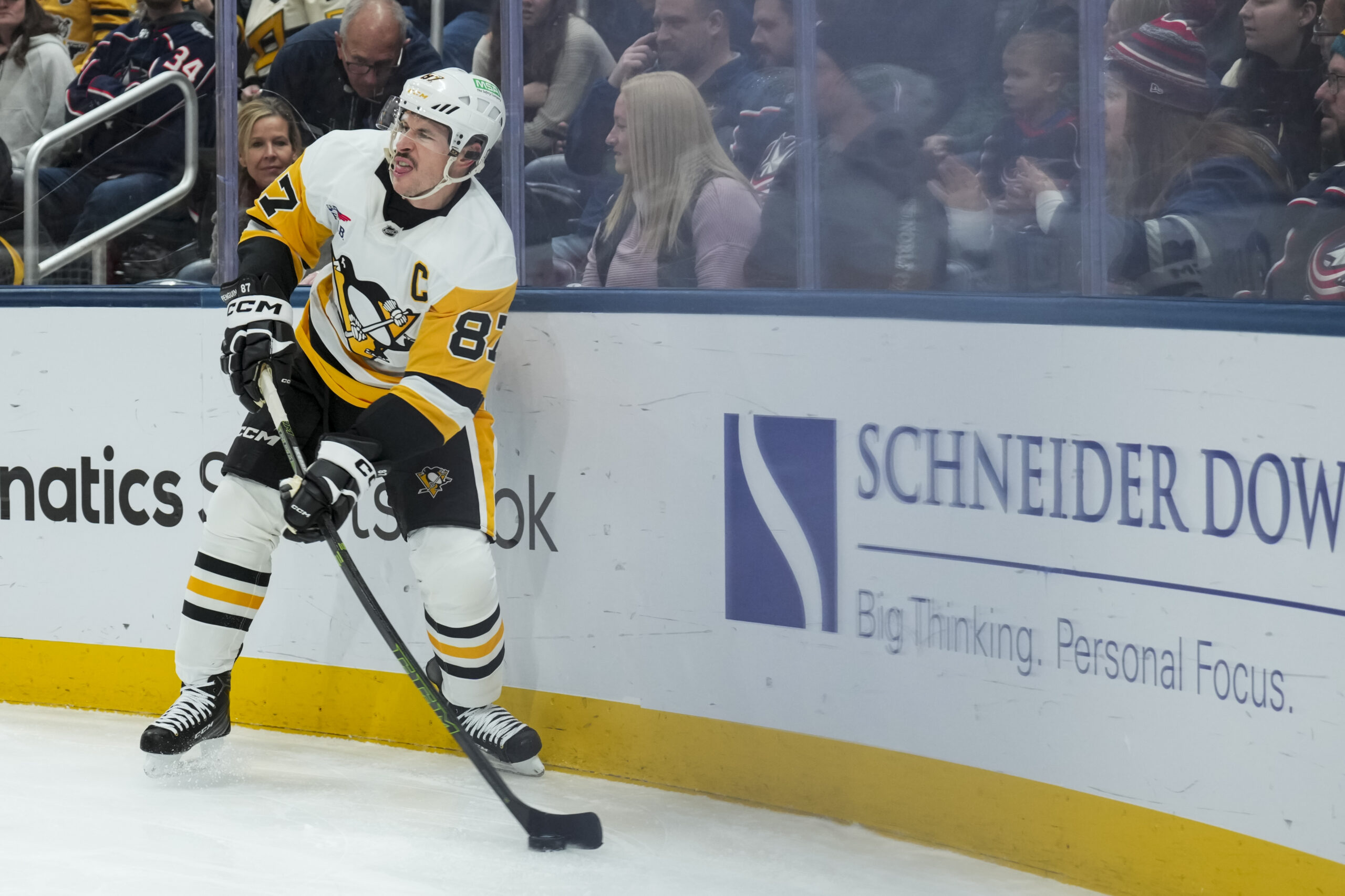 Nov 28, 2025; Columbus, Ohio, USA; Pittsburgh Penguins center Sidney Crosby (87) skates with the puck against the Columbus Blue Jackets in the first period at Nationwide Arena. Mandatory Credit: Aaron Doster-Imagn Images