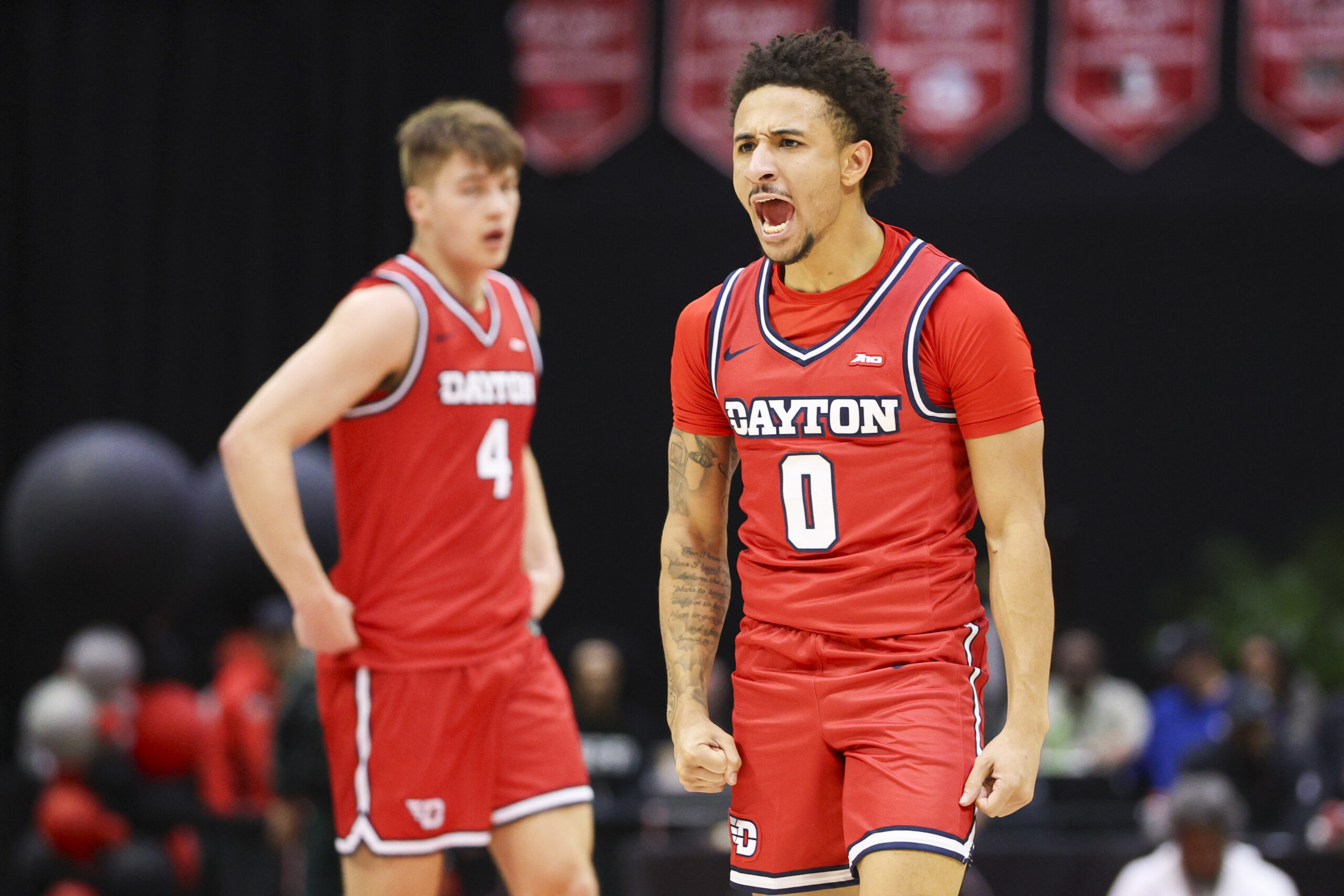 Nov 28, 2025; Kissimmee, FL, USA; Dayton Flyers guard Javon Bennett (0) reacts after a basket against the Brigham Young University Cougars in the first half during the ESPN Events Invitational at State Farm Field House. Mandatory Credit: Nathan Ray Seebeck-Imagn Images