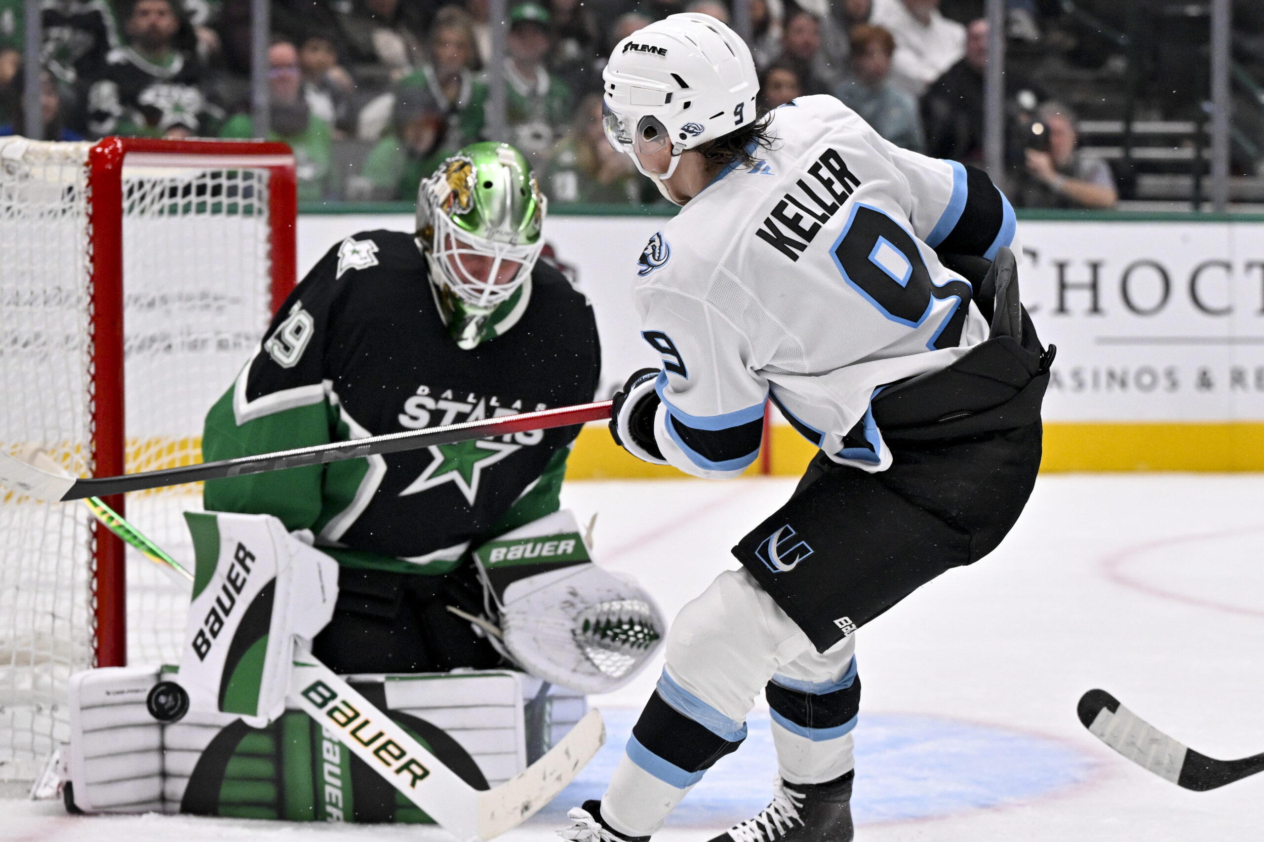 Nov 28, 2025; Dallas, Texas, USA; Dallas Stars goaltender Jake Oettinger (29) stops a shot by Utah Mammoth center Clayton Keller (9) during the third period at the American Airlines Center. Mandatory Credit: Jerome Miron-Imagn Images