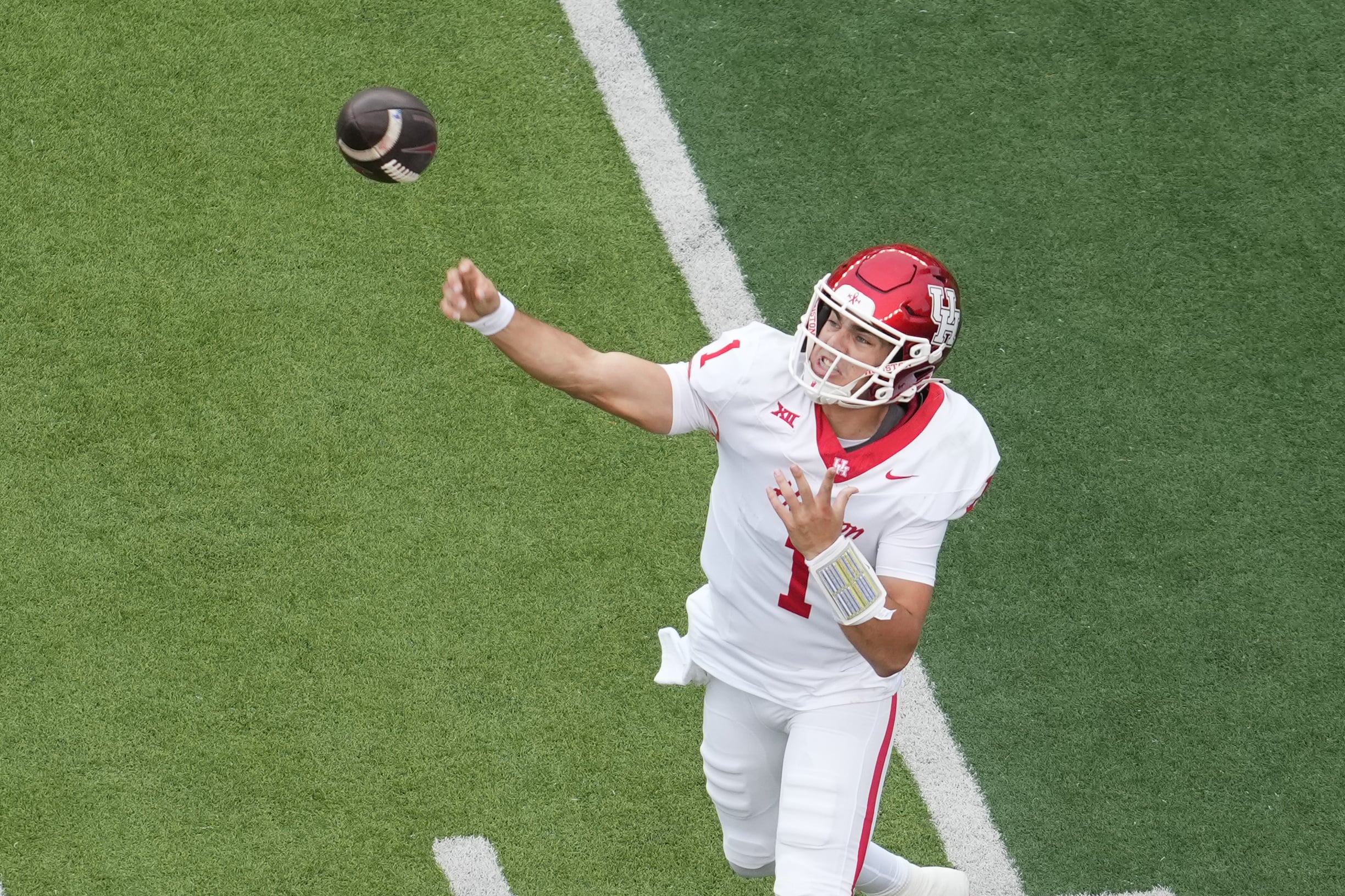 Nov 29, 2025; Waco, Texas, USA;  Houston Cougars quarterback Conner Weigman (1) passes the ball against the Baylor Bears during the first half at McLane Stadium. Mandatory Credit: Chris Jones-Imagn Images