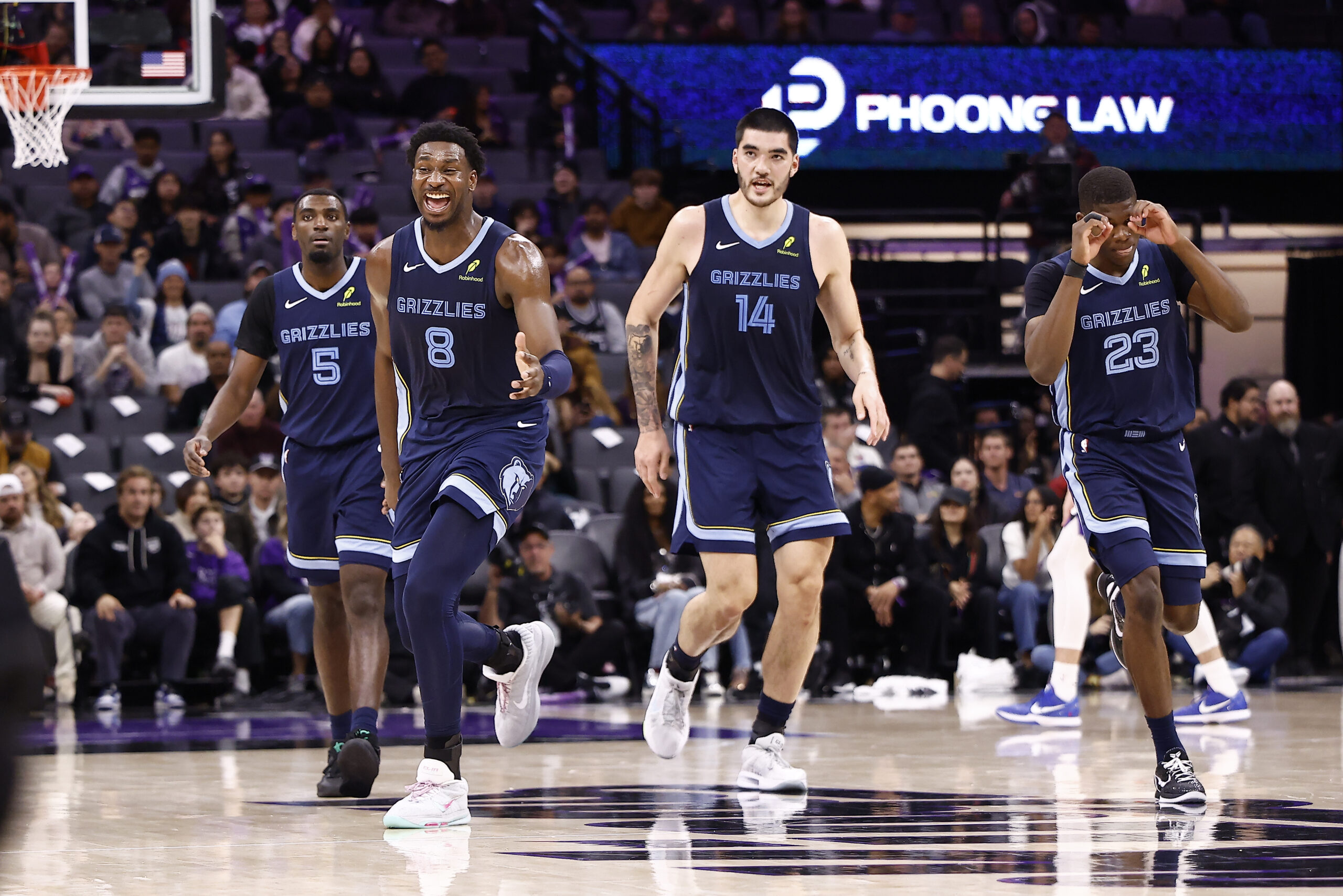 Nov 30, 2025; Sacramento, California, USA; Memphis Grizzlies forward/center Jaren Jackson Jr. (8) celebrates after a play as a timeout is called during the fourth quarter at Golden 1 Center. Mandatory Credit: Kelley L Cox-Imagn Images