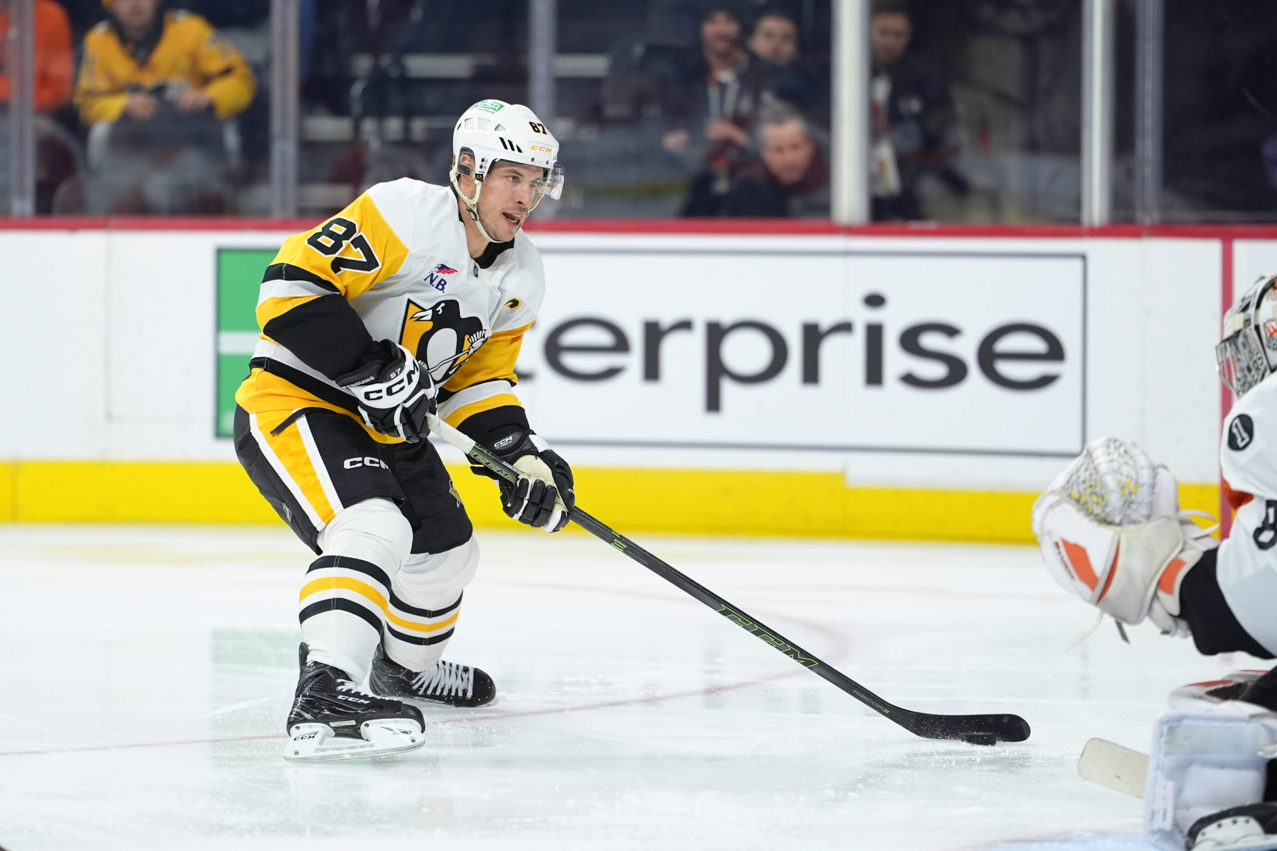 Dec 1, 2025; Philadelphia, Pennsylvania, USA; Pittsburgh Penguins center Sidney Crosby (87) controls the puck against the Philadelphia Flyers in the second period at Xfinity Mobile Arena. Mandatory Credit: Kyle Ross-Imagn Images
