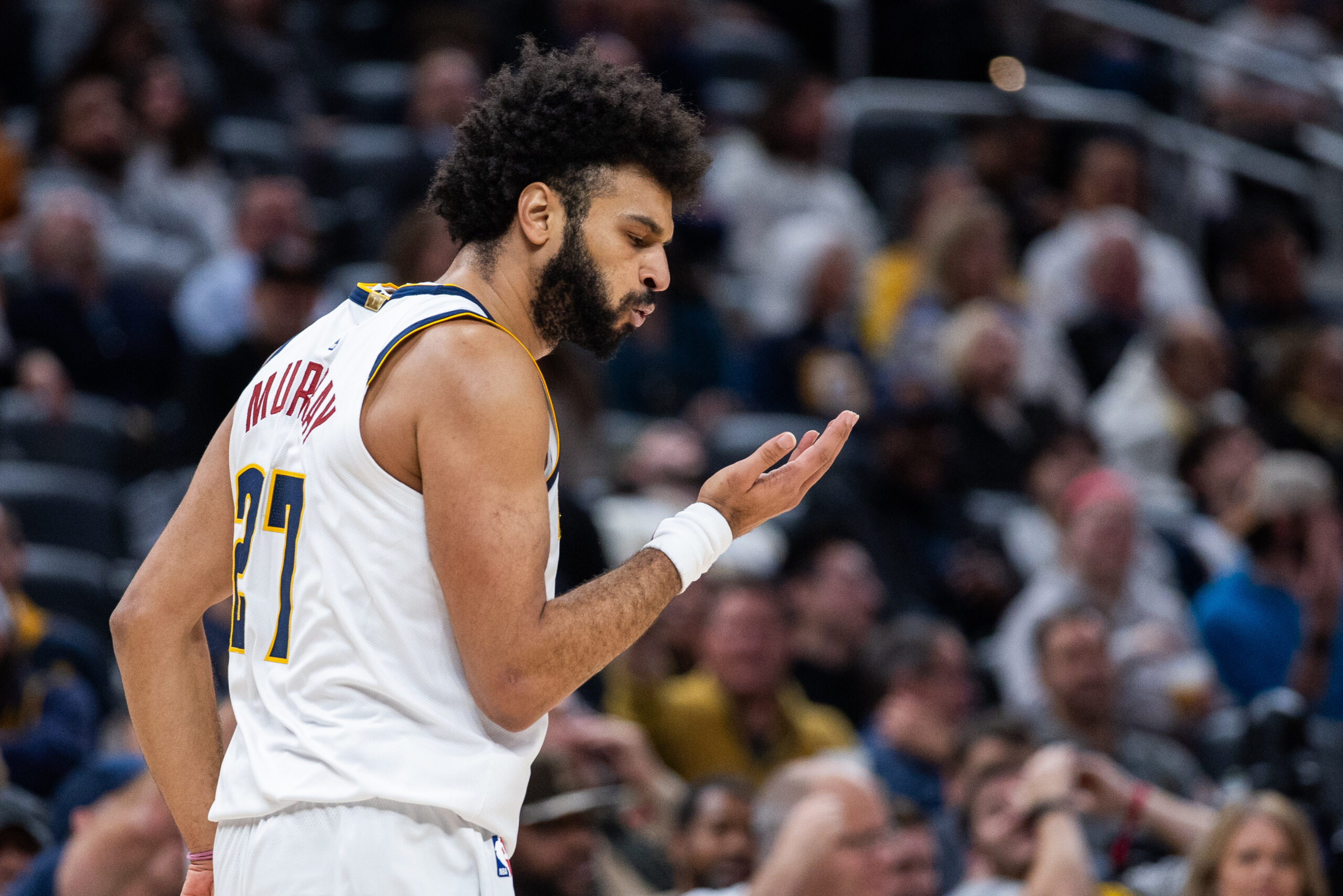 Dec 3, 2025; Indianapolis, Indiana, USA; Denver Nuggets guard Jamal Murray (27) celebrates a made basket in the second half against the Indiana Pacers at Gainbridge Fieldhouse. Mandatory Credit: Trevor Ruszkowski-Imagn Images