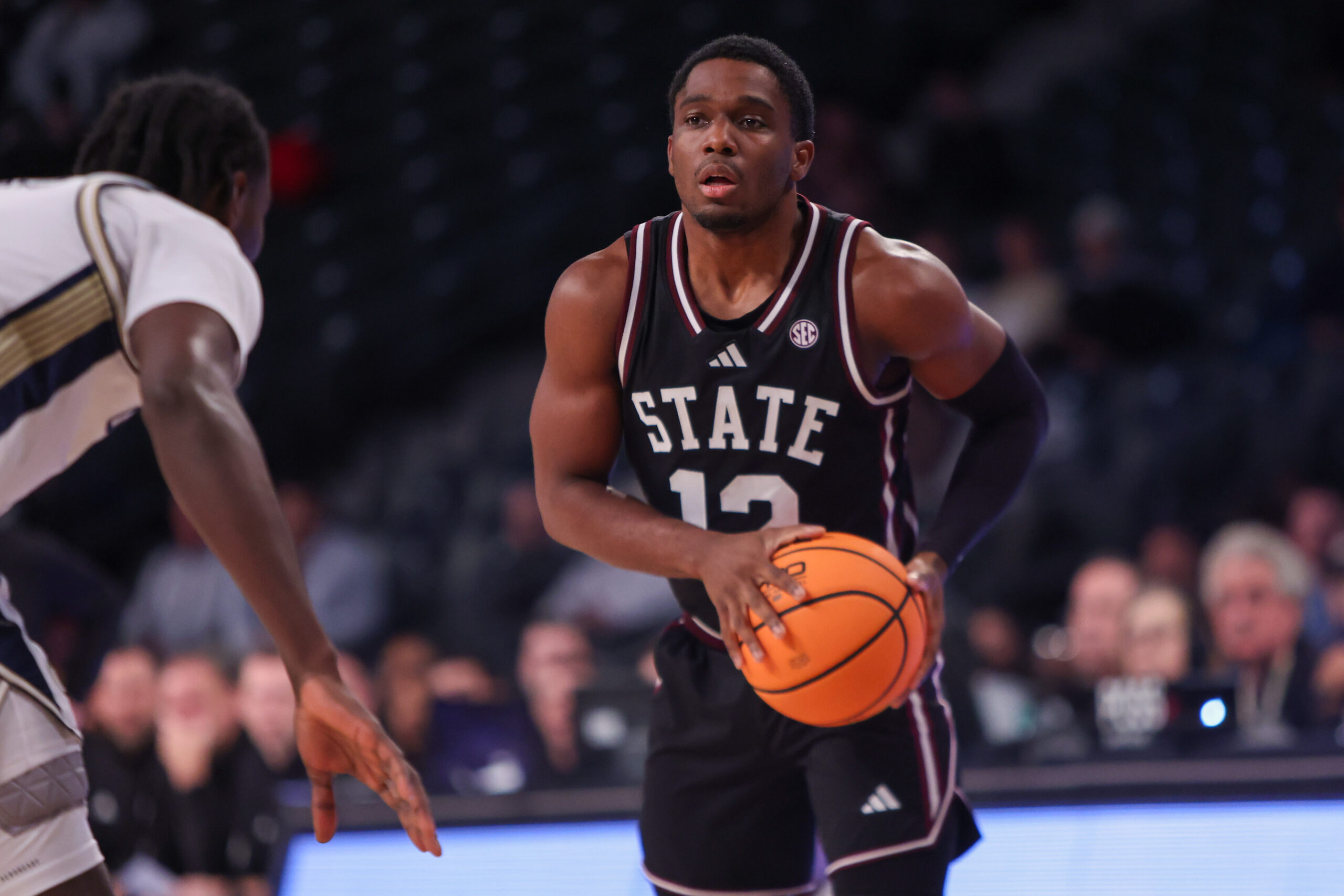 Dec 3, 2025; Atlanta, Georgia, USA; Mississippi State Bulldogs guard Josh Hubbard (12) dribbles against the Georgia Tech Yellow Jackets in the first half at McCamish Pavilion. Mandatory Credit: Brett Davis-Imagn Images