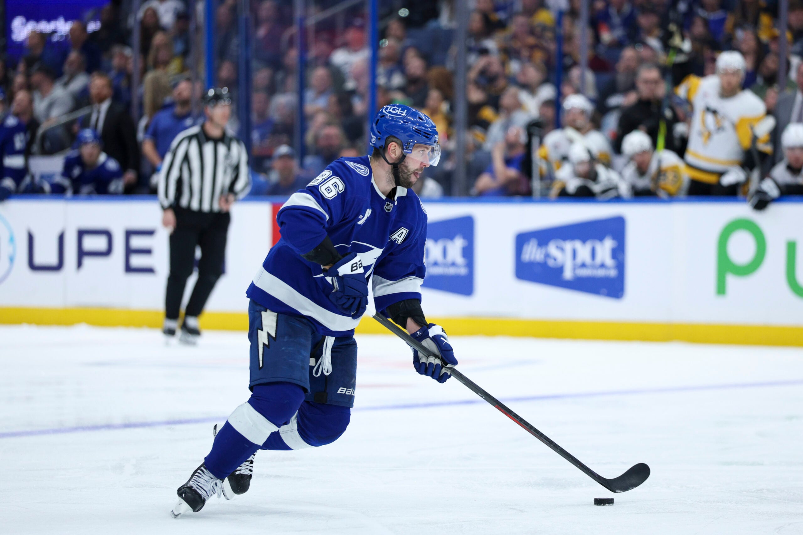 Dec 4, 2025; Tampa, Florida, USA; Tampa Bay Lightning right wing Nikita Kucherov (86) controls the puck against the Pittsburgh Penguins in the third period at Benchmark International Arena. Mandatory Credit: Nathan Ray Seebeck-Imagn Images