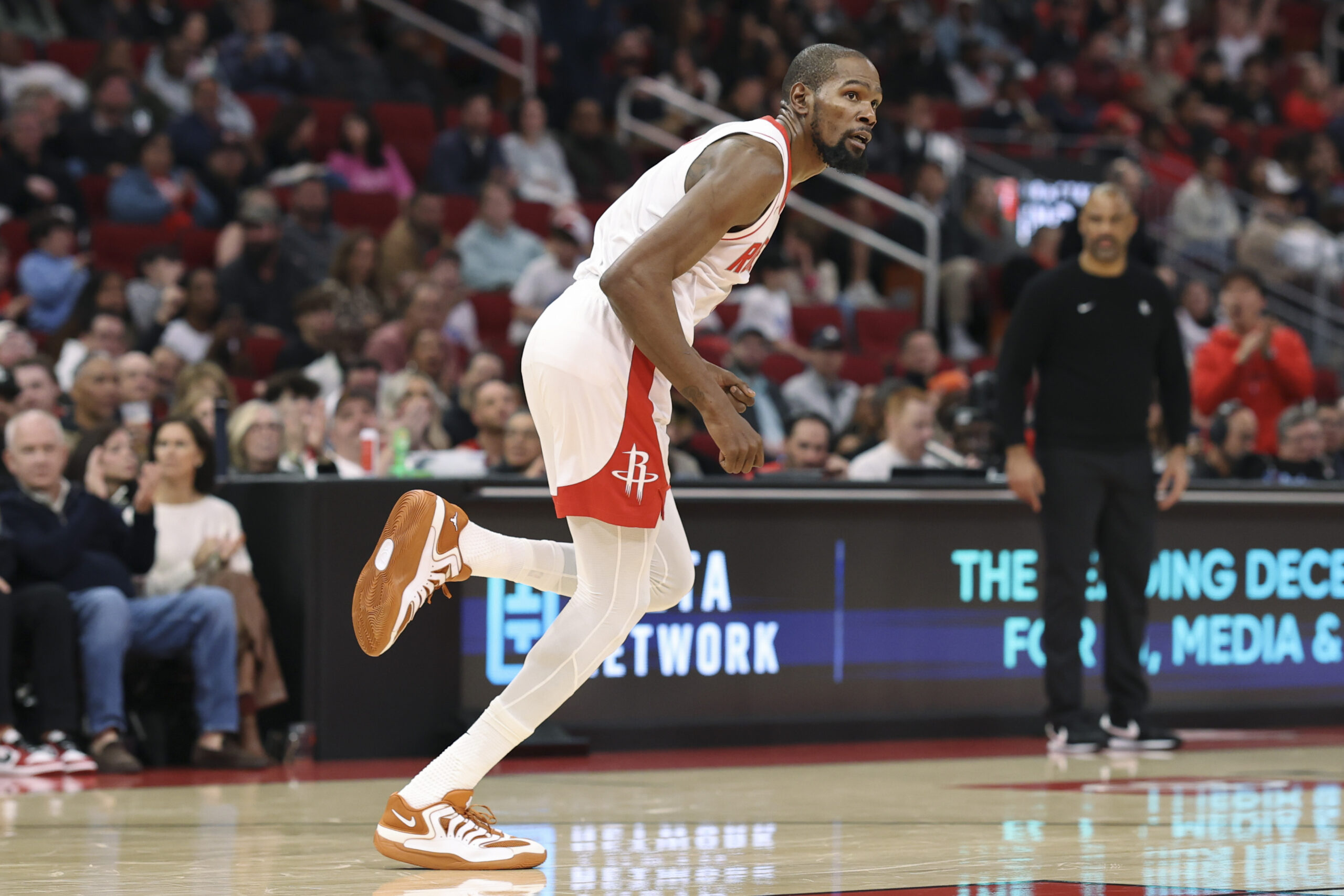 Dec 5, 2025; Houston, Texas, USA; Houston Rockets forward Kevin Durant (7) reacts after scoring a basket during the first half against the Phoenix Suns at Toyota Center. Mandatory Credit: Troy Taormina-Imagn Images